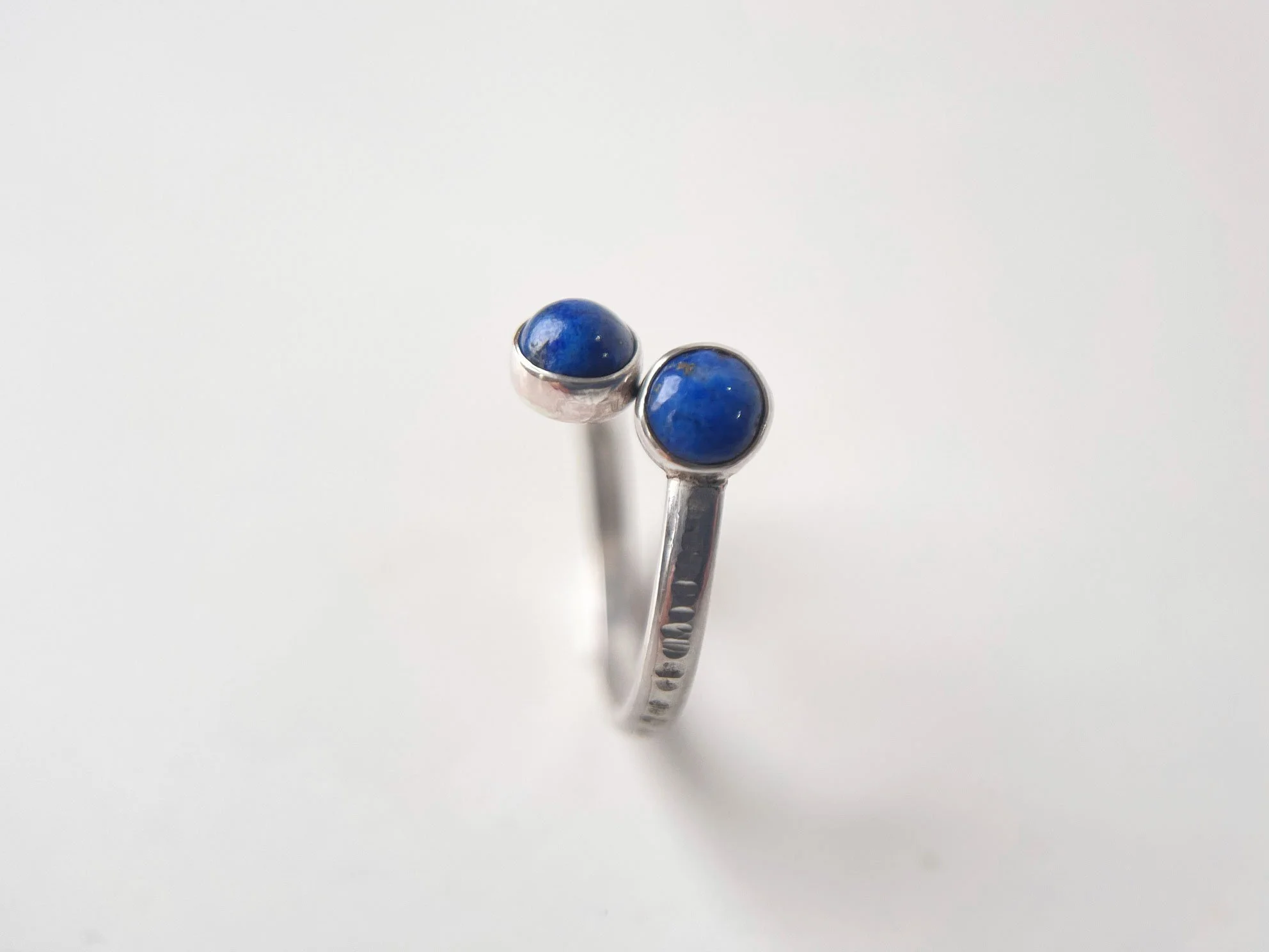 double ended turqoise ring white background