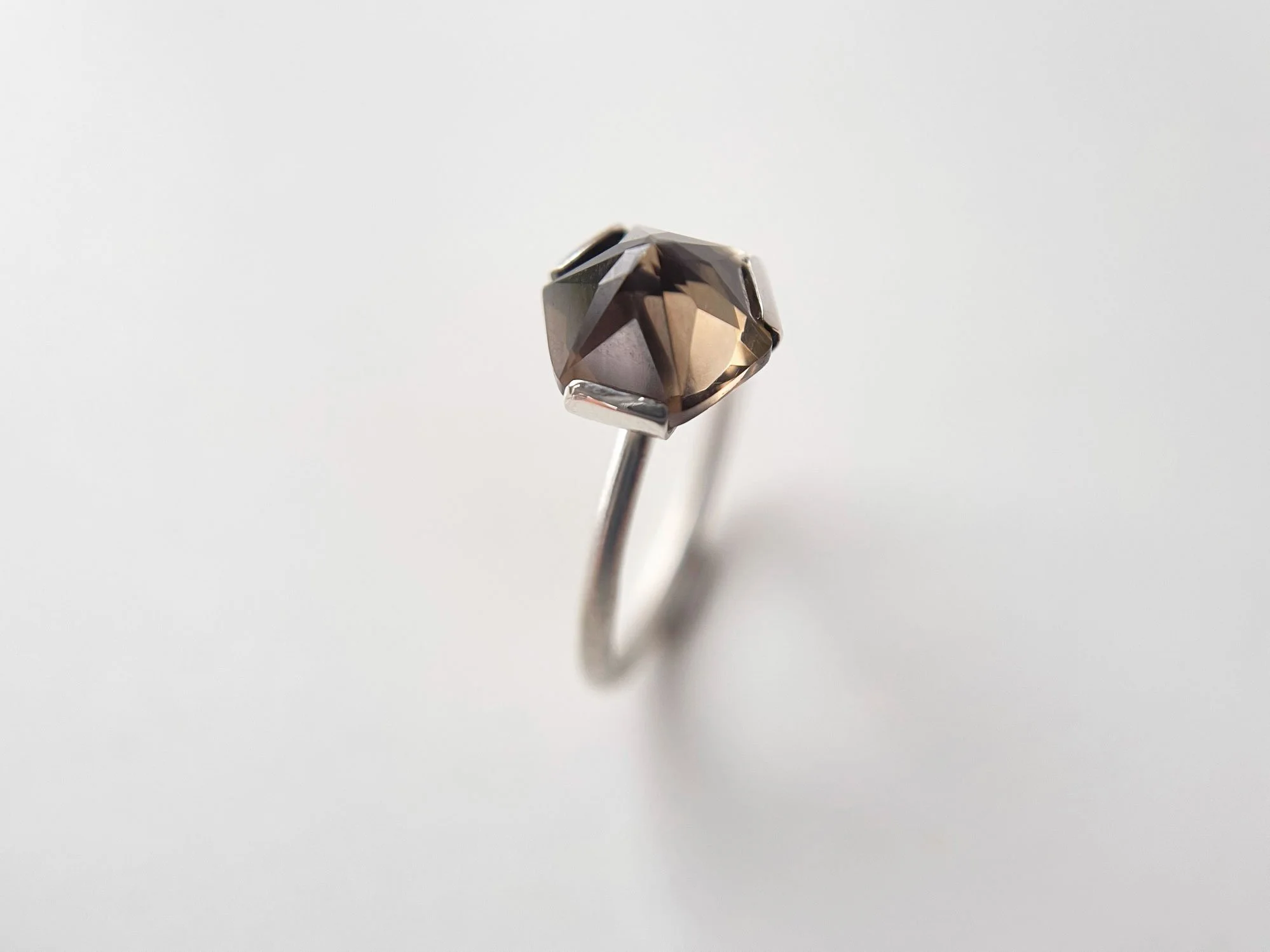 faceted smoky quartz and sterling silver ring close up