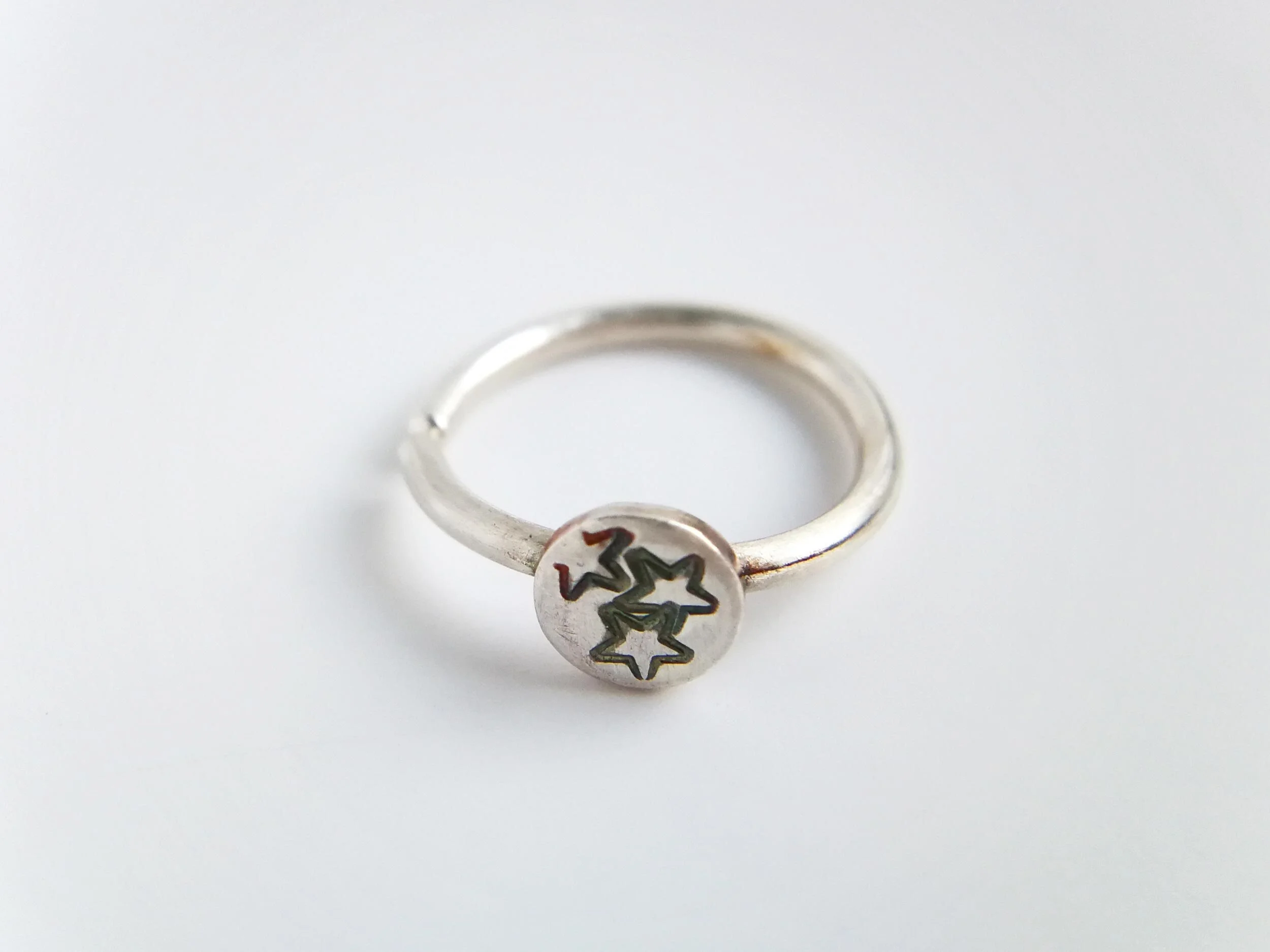 Handmade stars conch hoop on white background