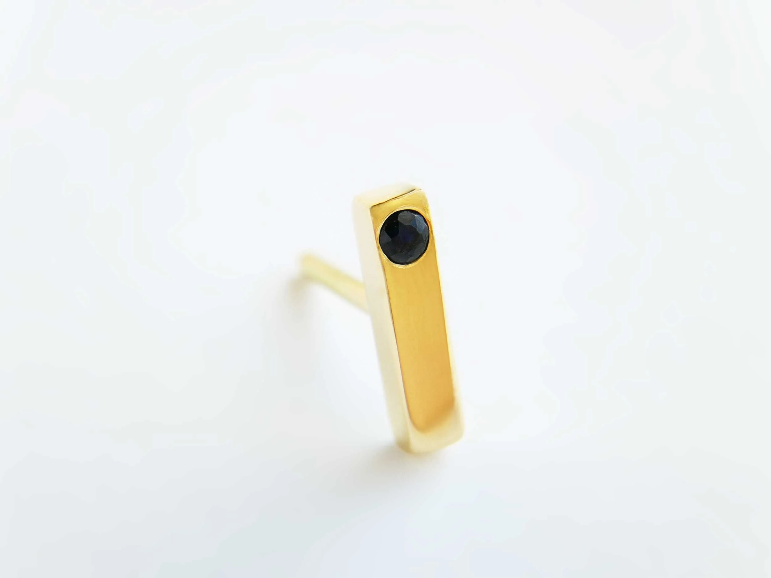 18k gold and sapphire piercing jewelry