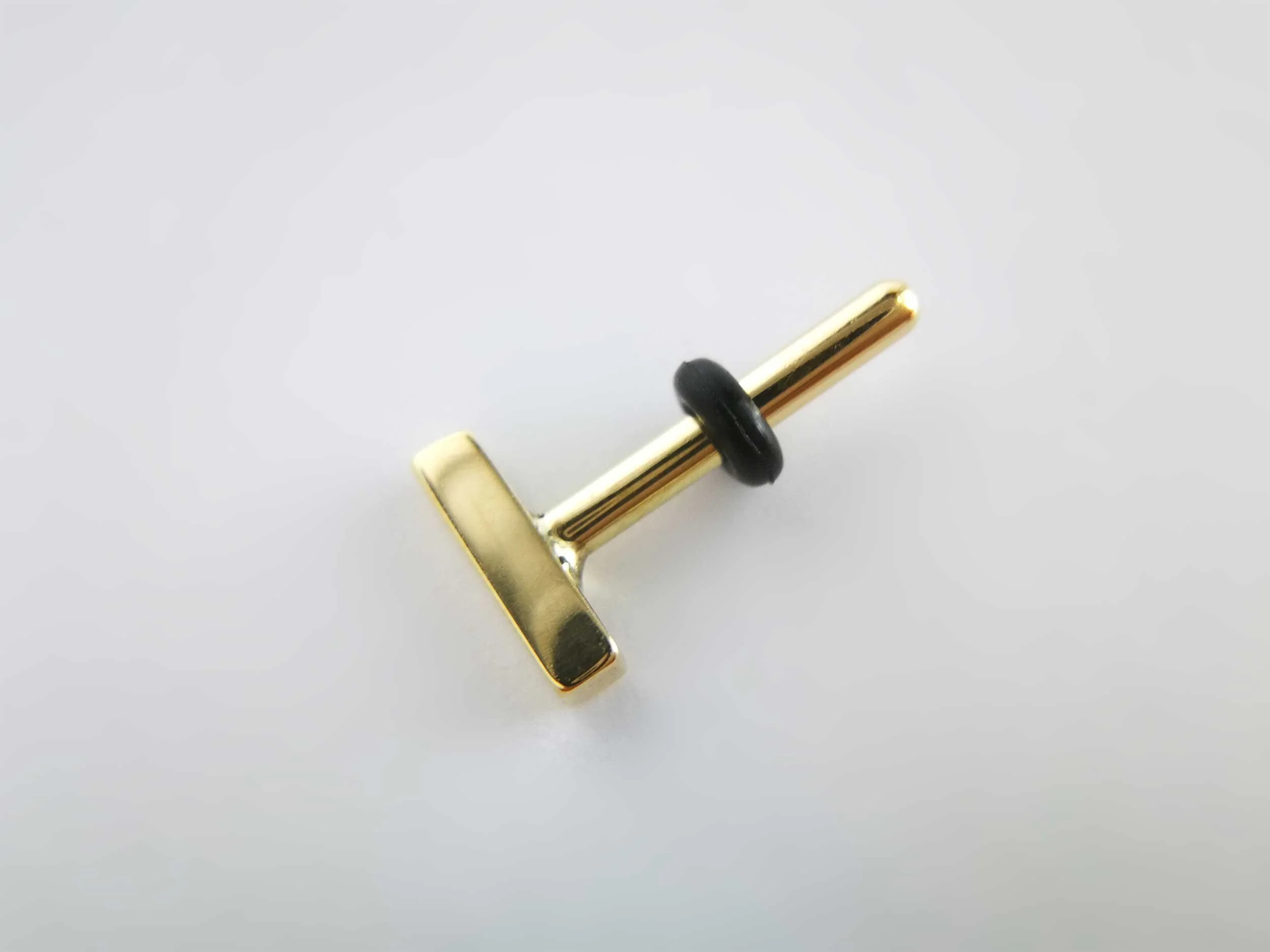18k gold conch earring white background Victoria Grace Silversmith