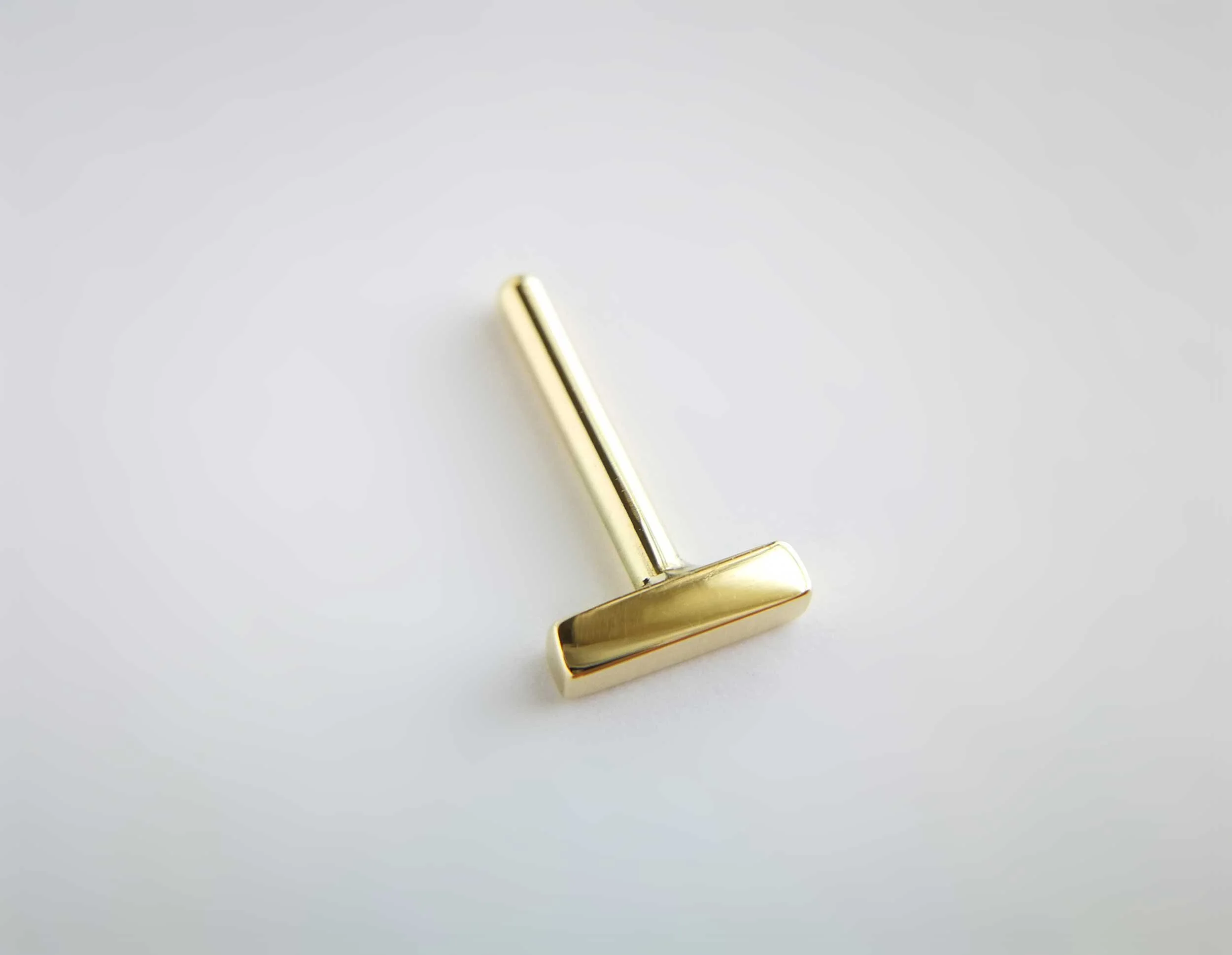 18k gold helix earring product photo white background