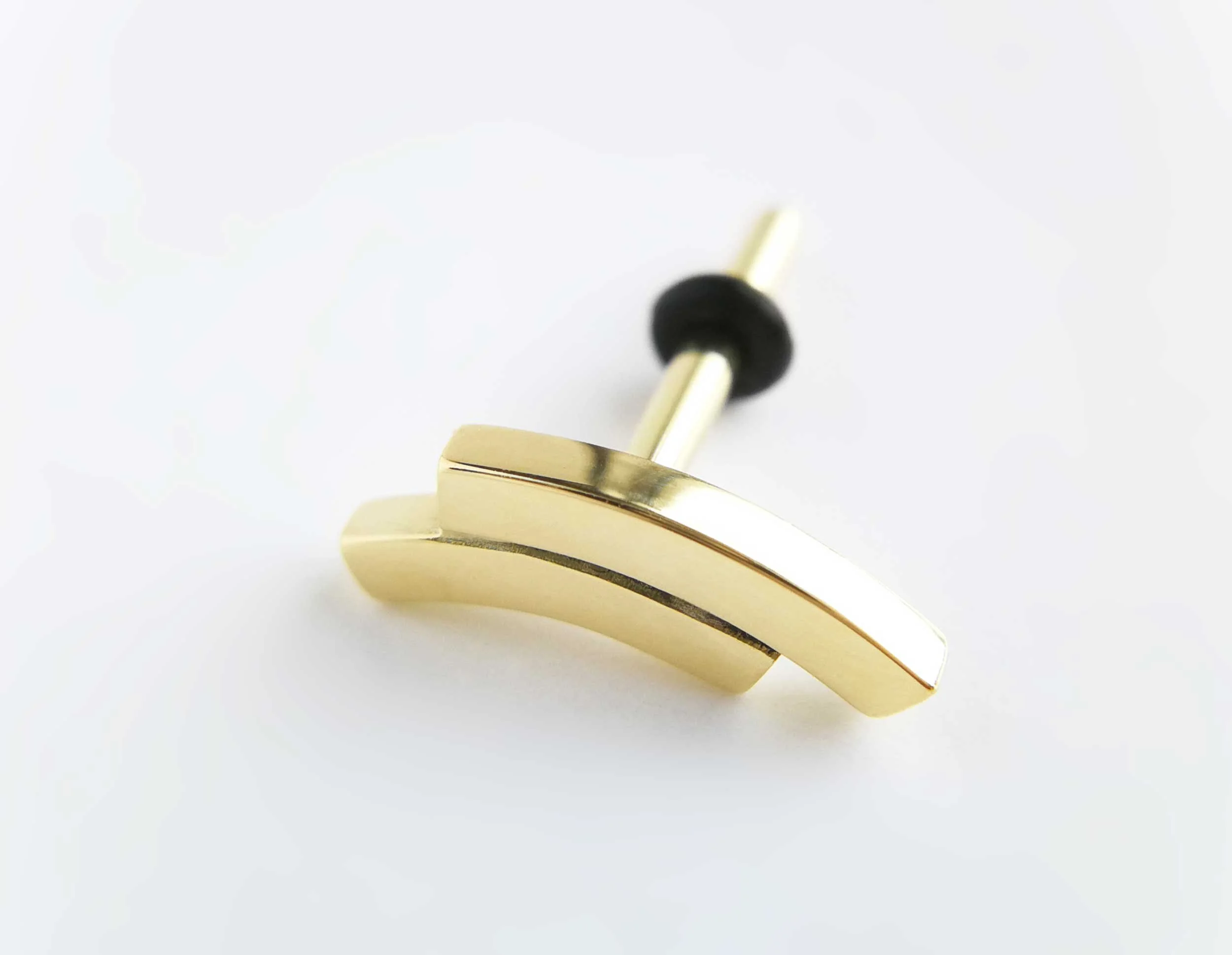 solid gold conch stud white background handmade piercing jewellery victoria grace