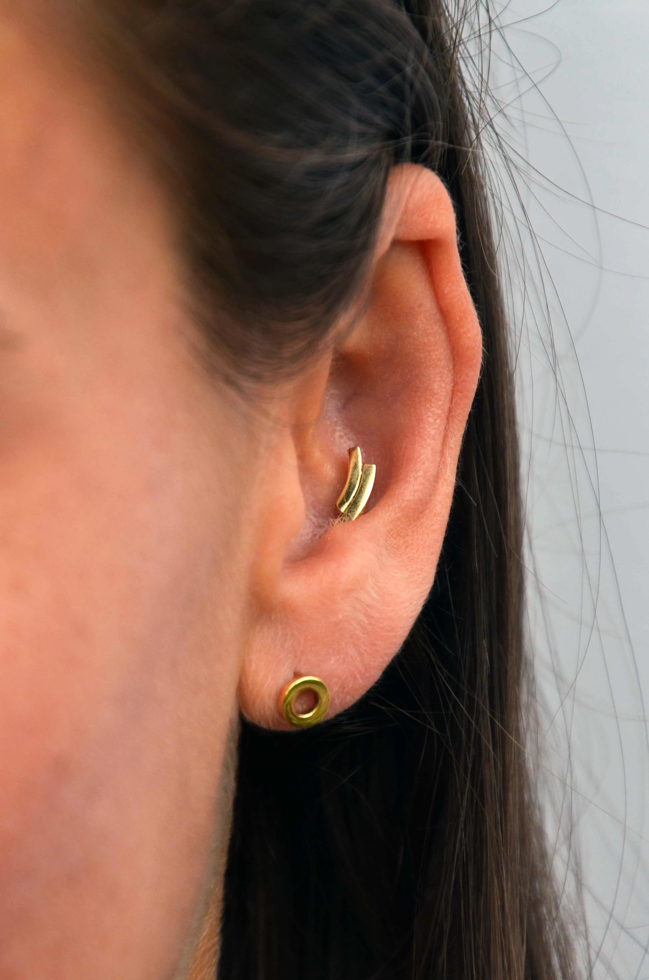 18ct yellow gold conch earring handmade victoria grace silversmith on model