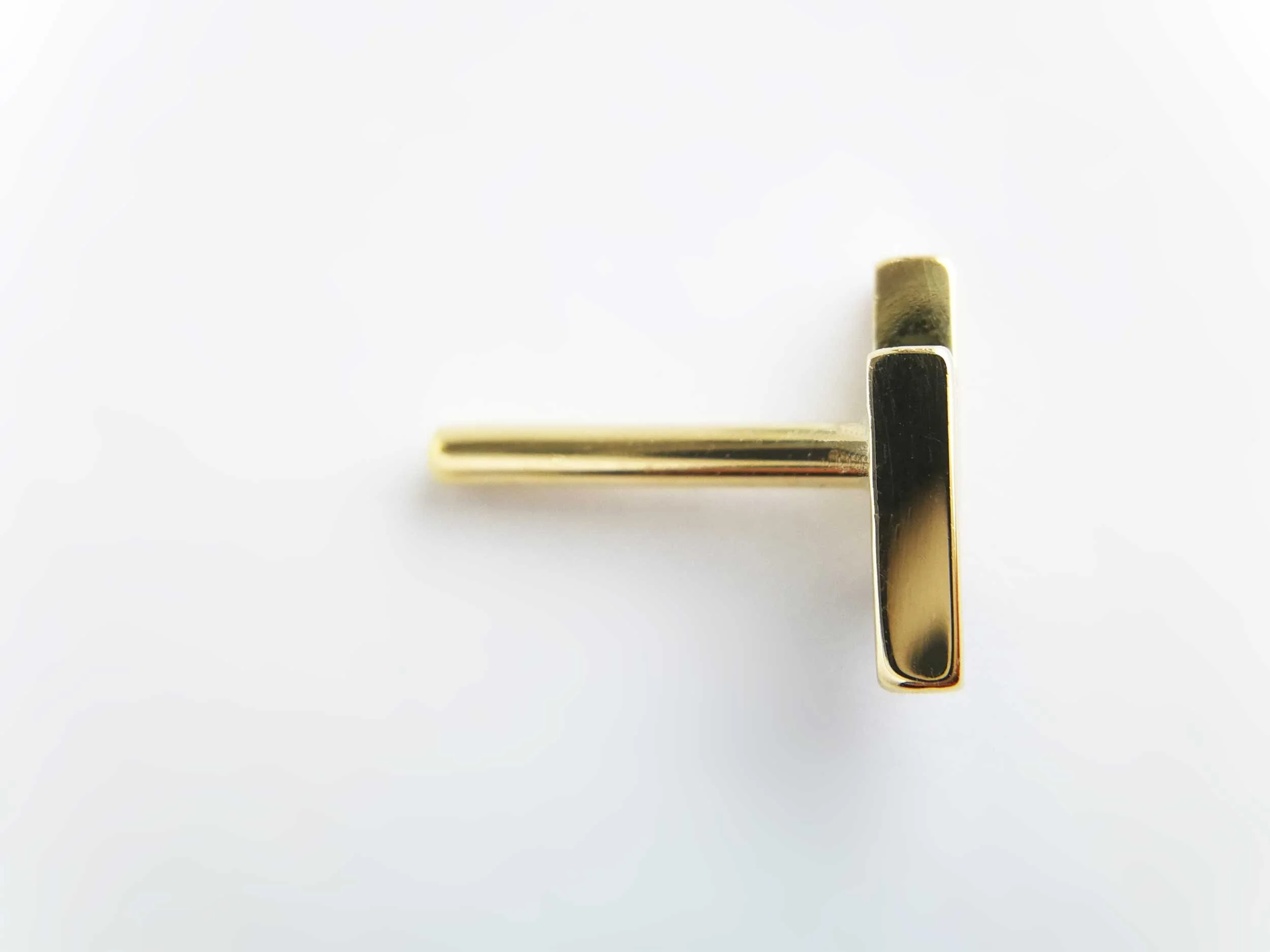 solid 18ct gold helix earring white background the aurum collection victoria grace