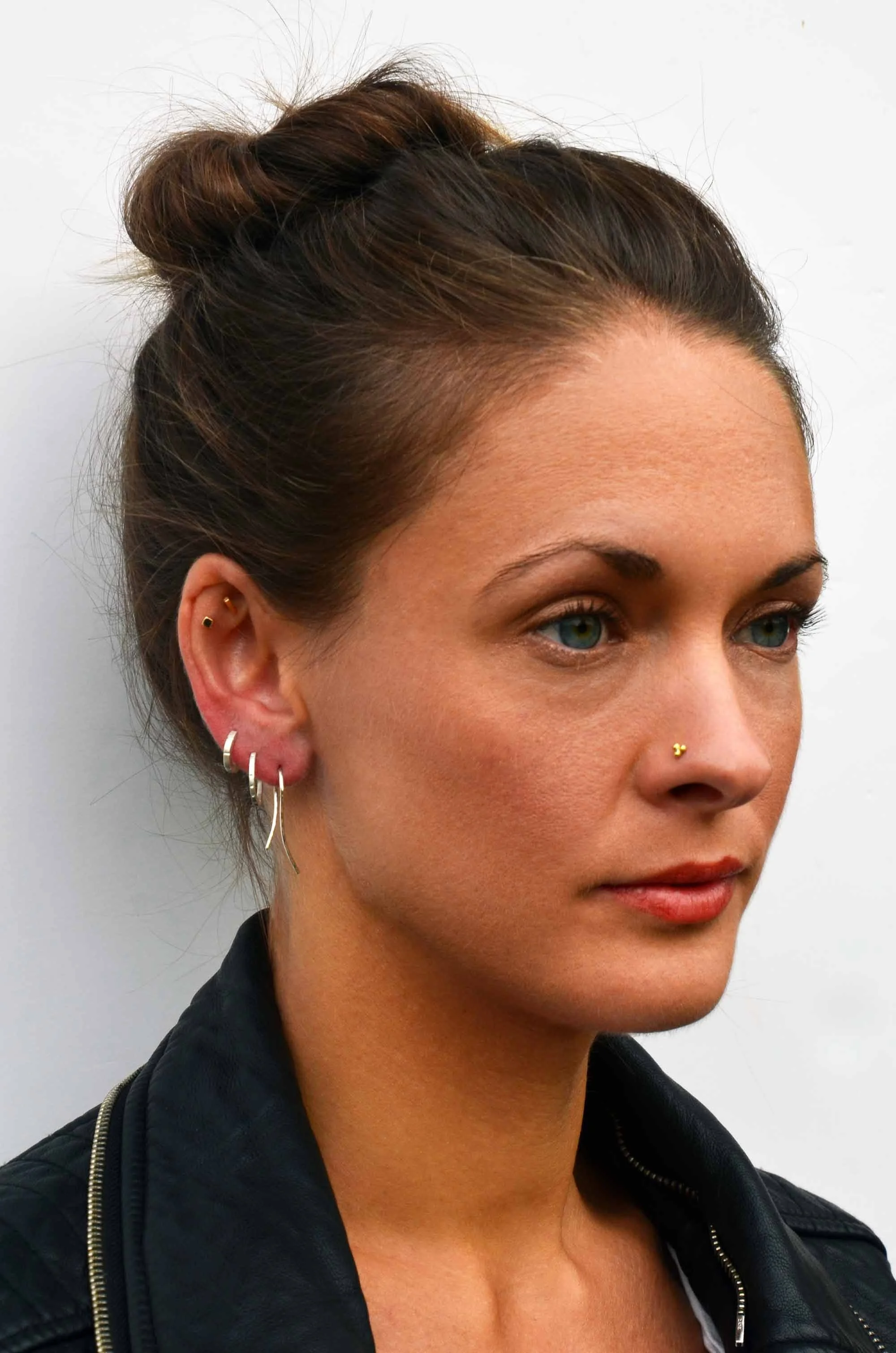 recycled sterling silver wire earrings on model handmade jewellery