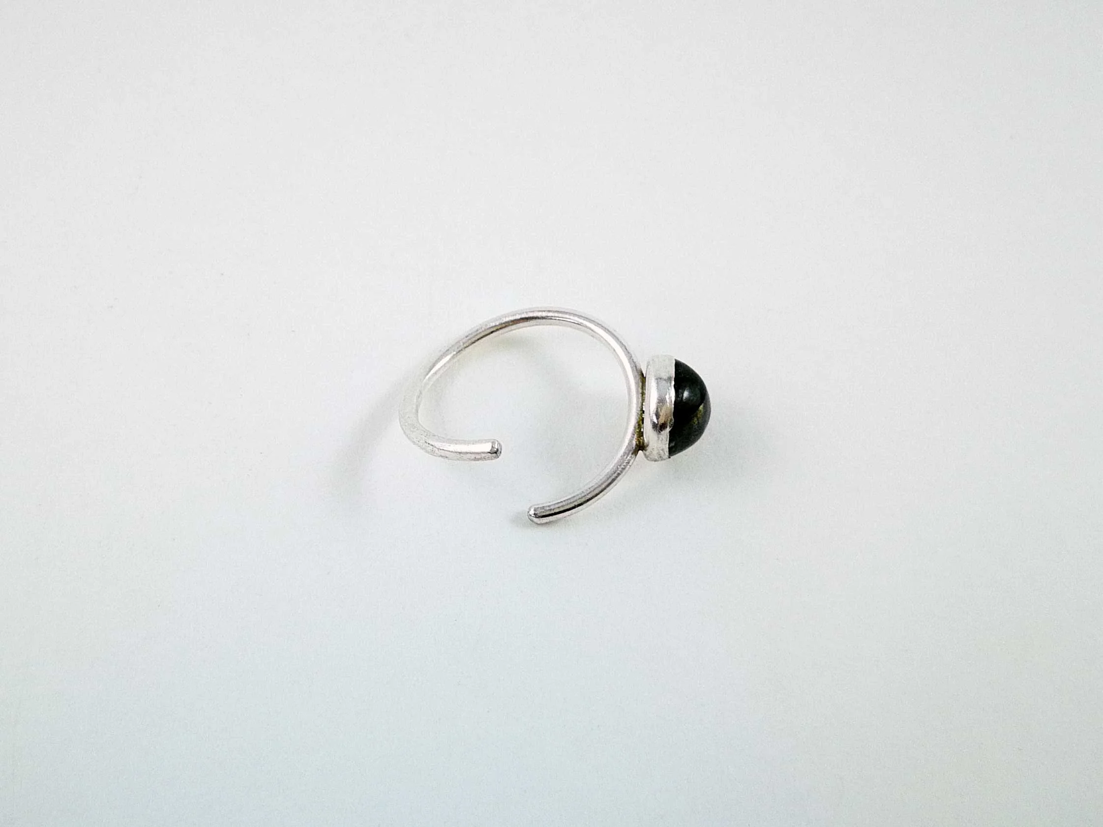 endless hoop conch ring on white background