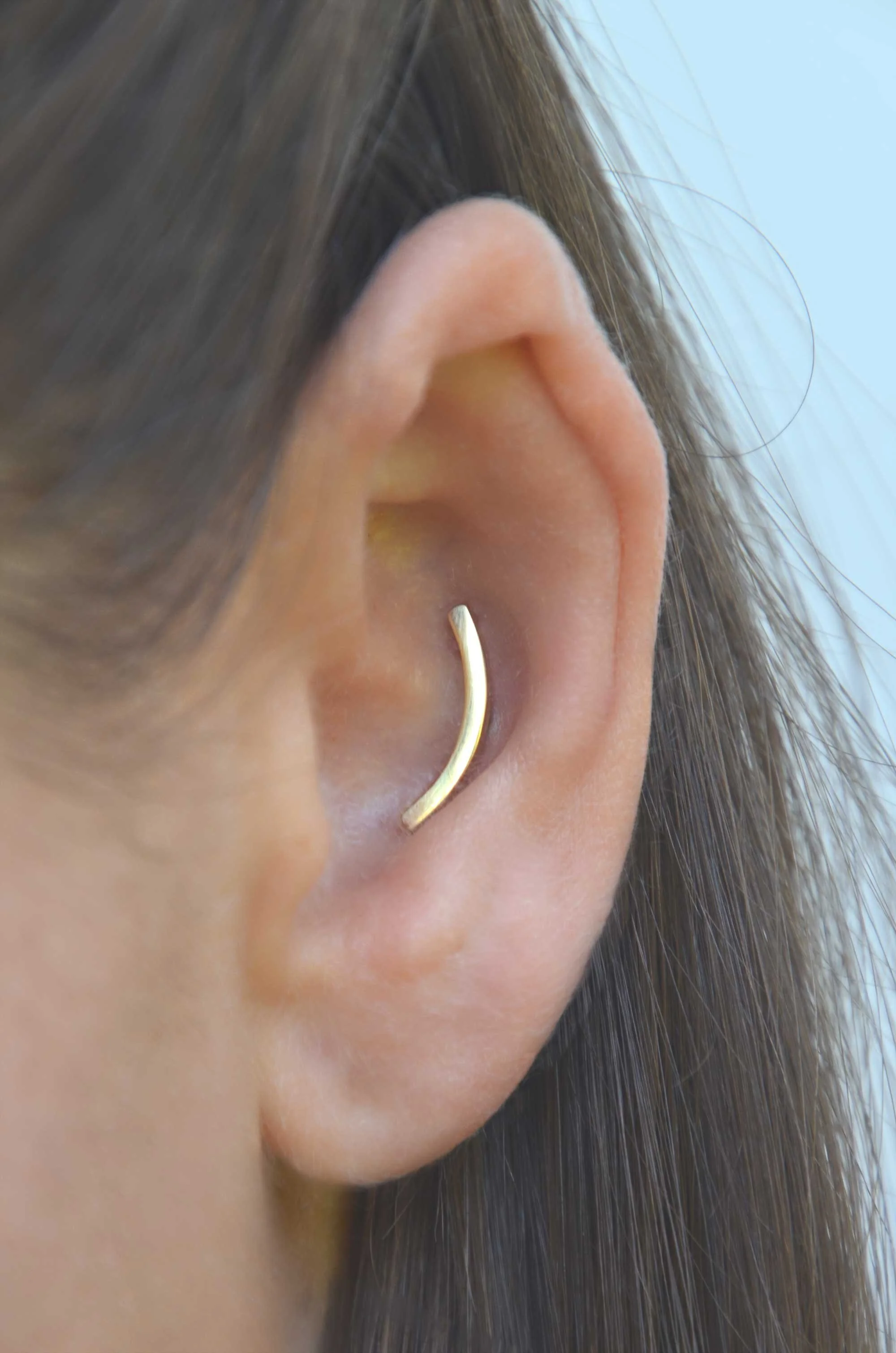 handmade 18ct gold conch earring luxury piercing