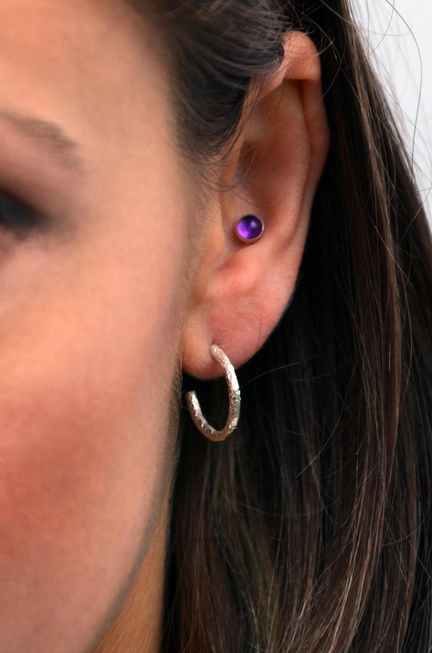 Winter earrings recycled silver hoops on model