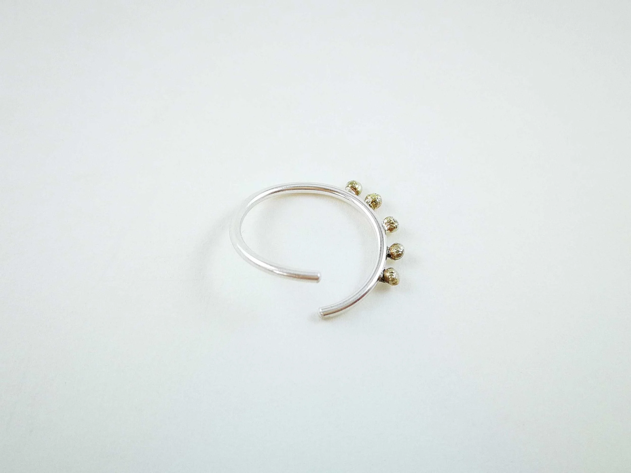 endless-conch-hoop-with-solid-gold-balls-by-victoria-grace-silversmith.jpg