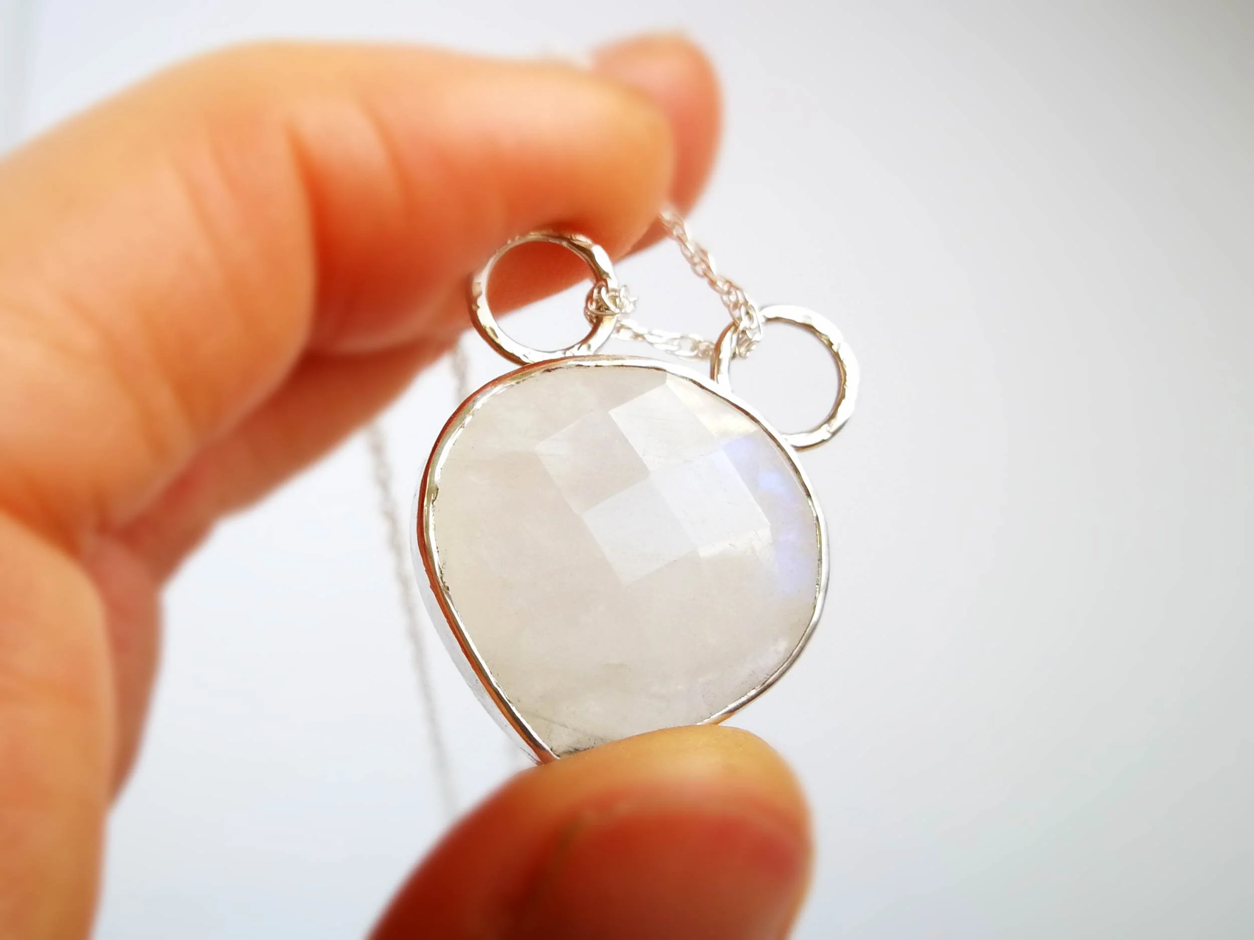 Rainbow moonstone pendant close up