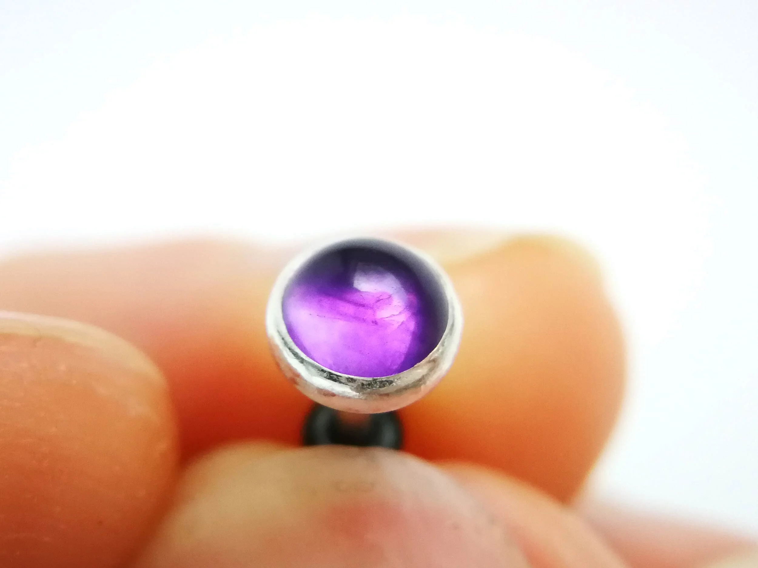 Purple amethyst conch stud close up handmade victoria grace silversmith