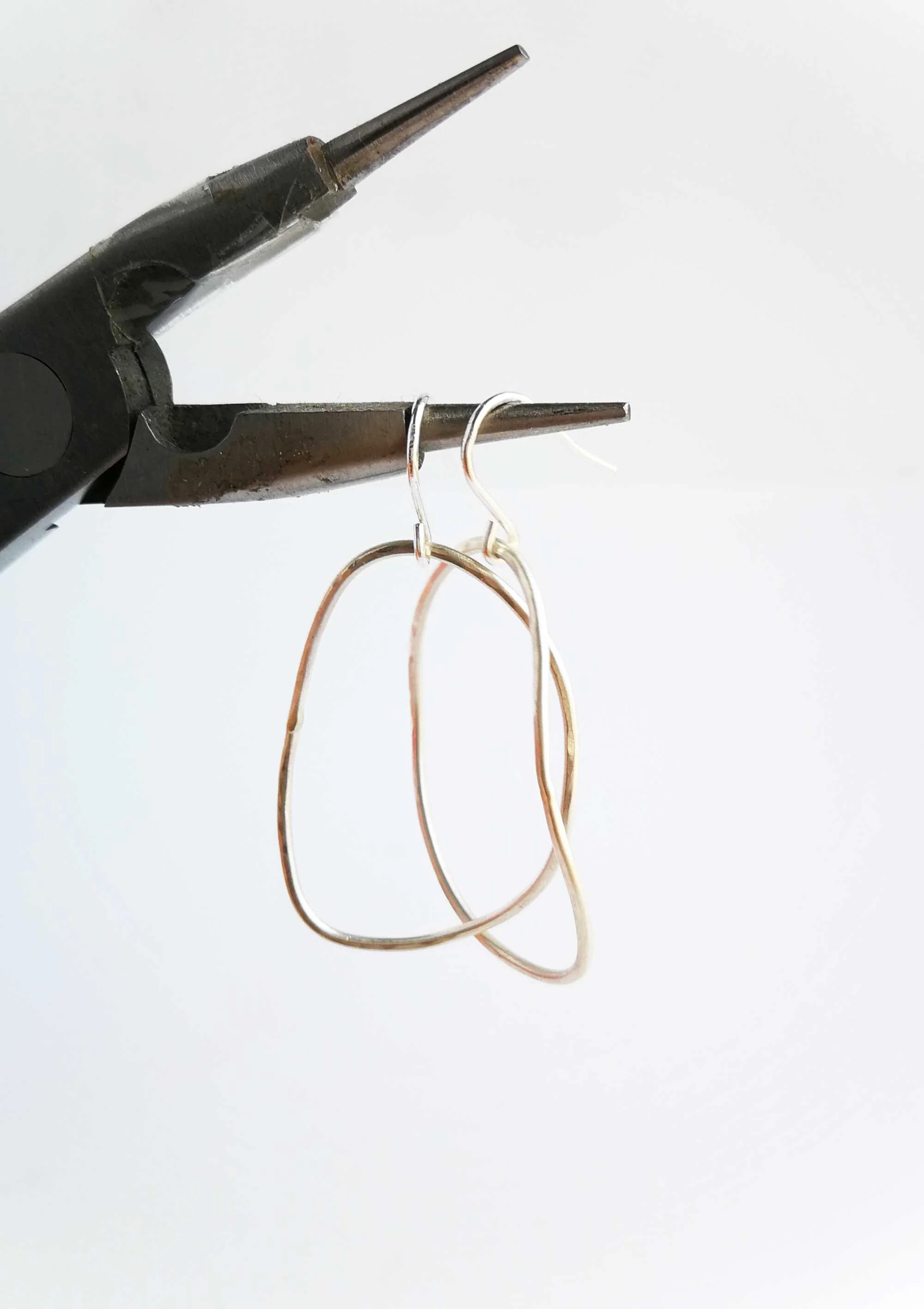 Handmade jewellery sterling silver wavy hoop earrings