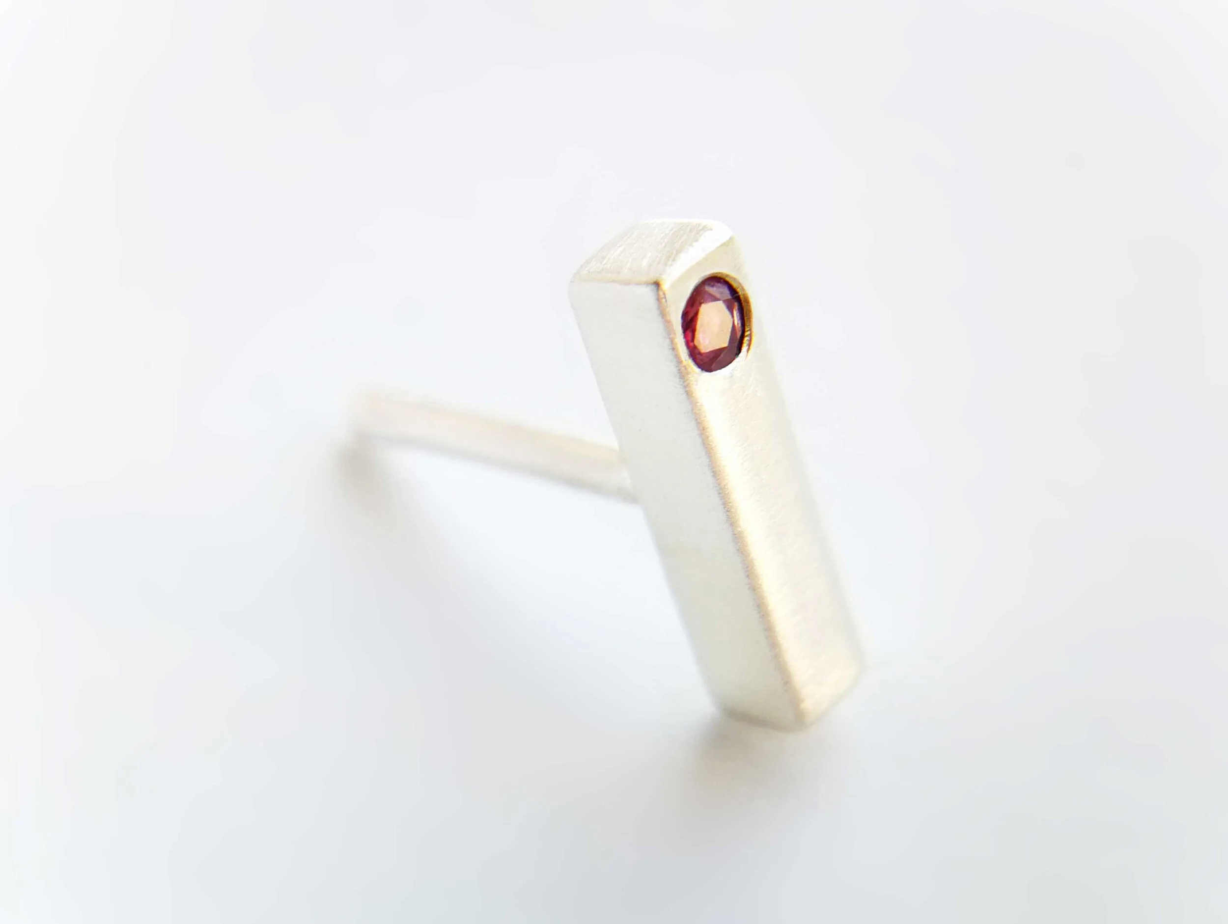 luxury piercing jewellery ruby and sterling silver handmade stud