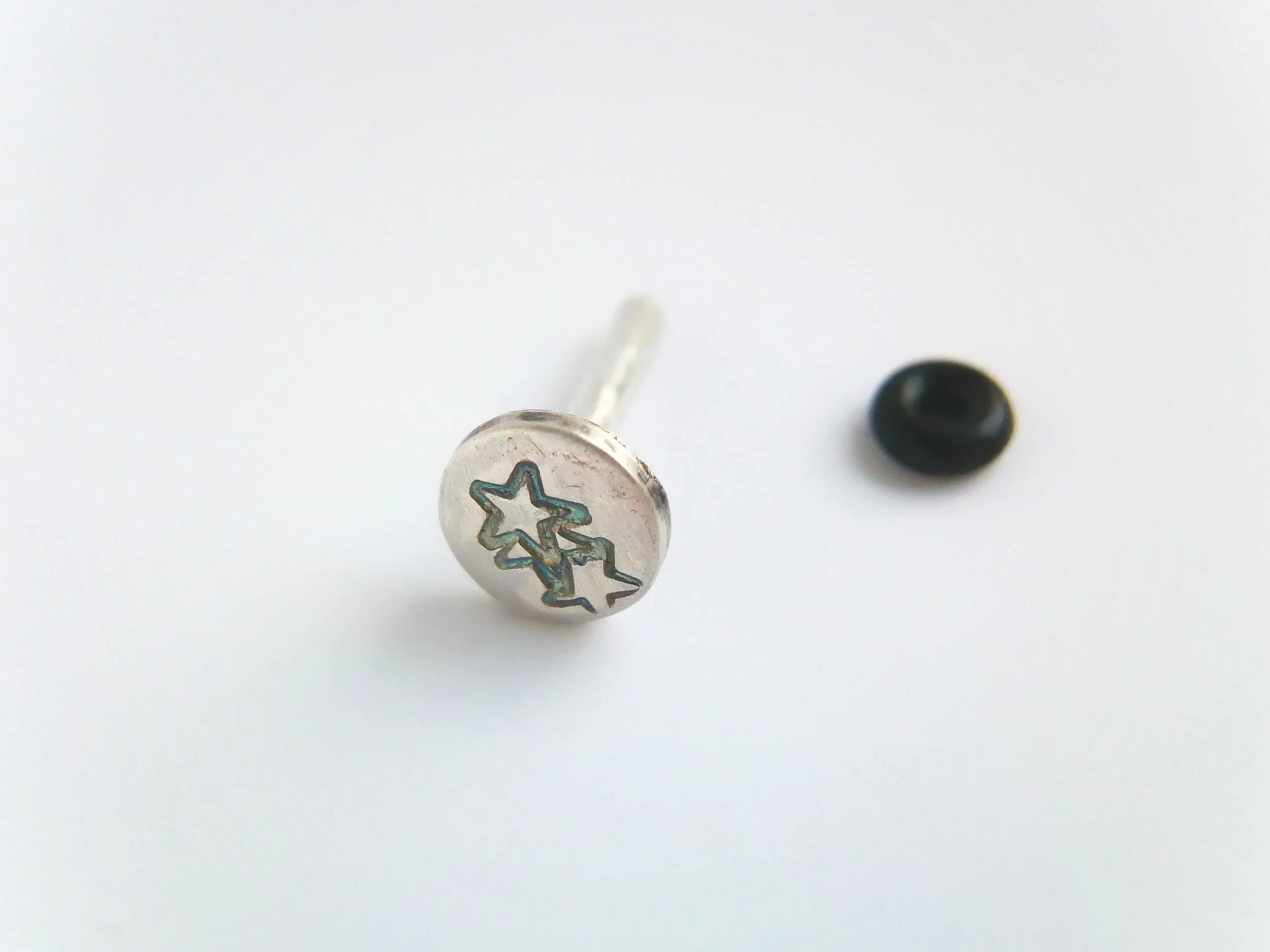 Handmade stars helix earring winterland collection white background