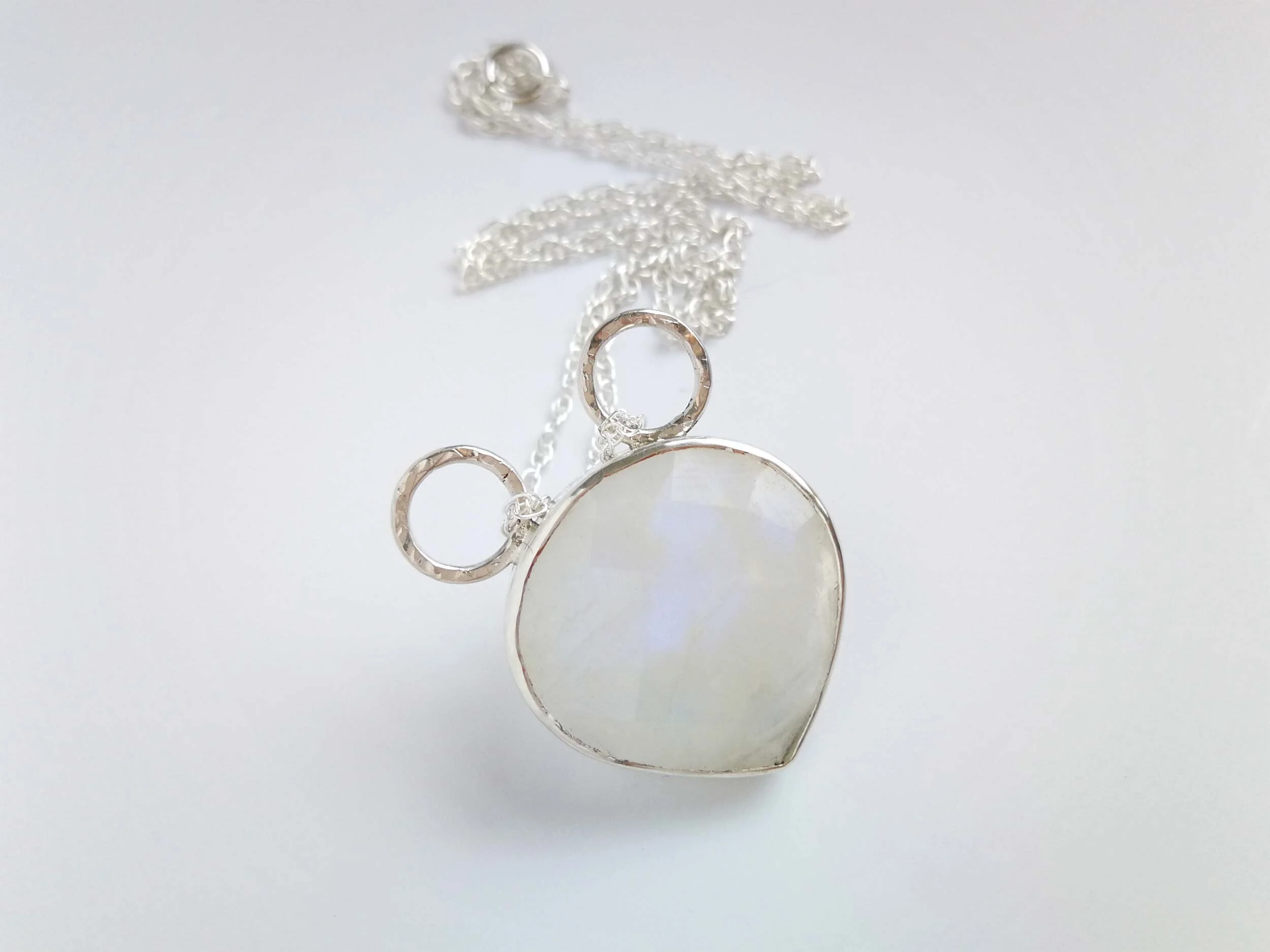 Rainbow moonstone pendant on rope chain