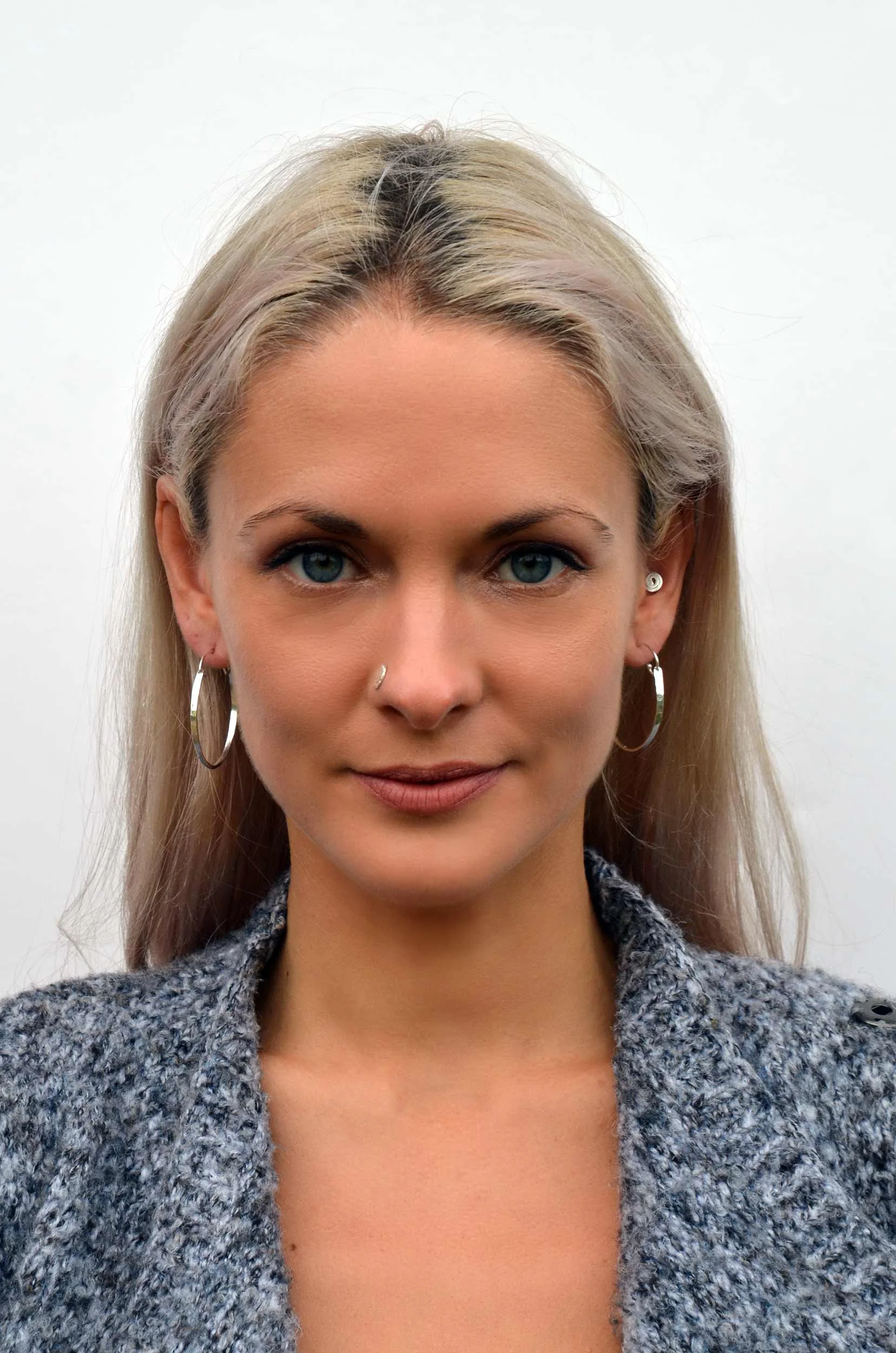 handmade silver hoop earrings on model