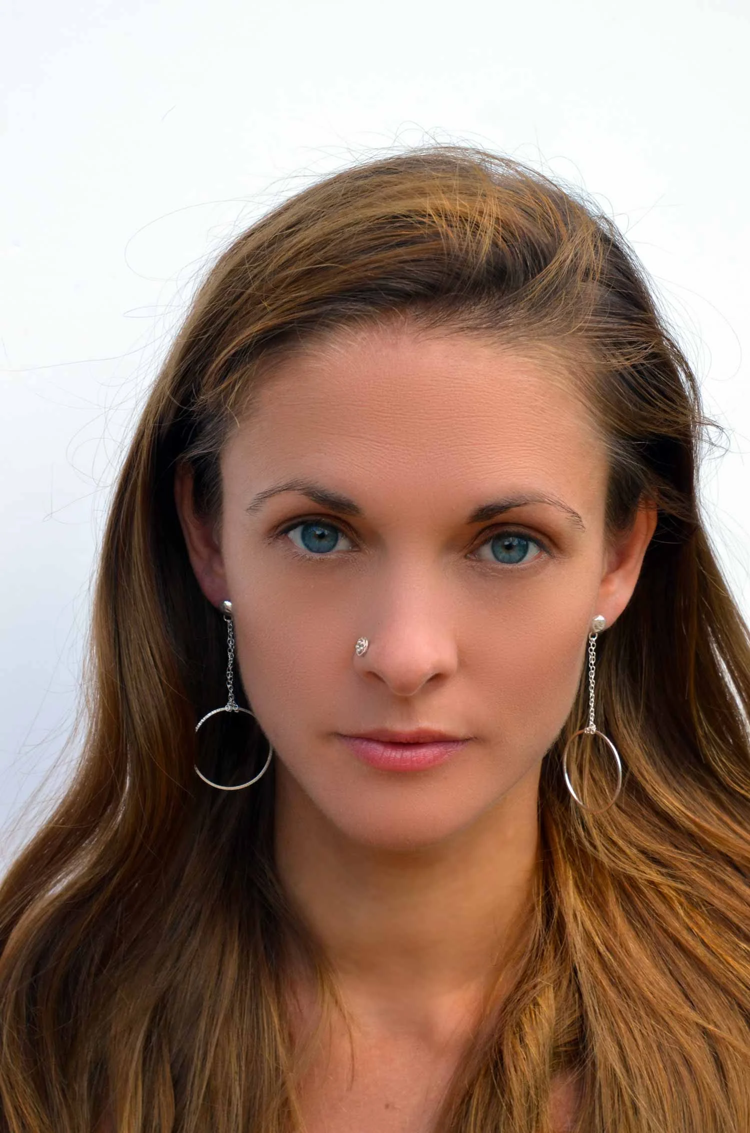 silver hoop earrings on model victoria grace