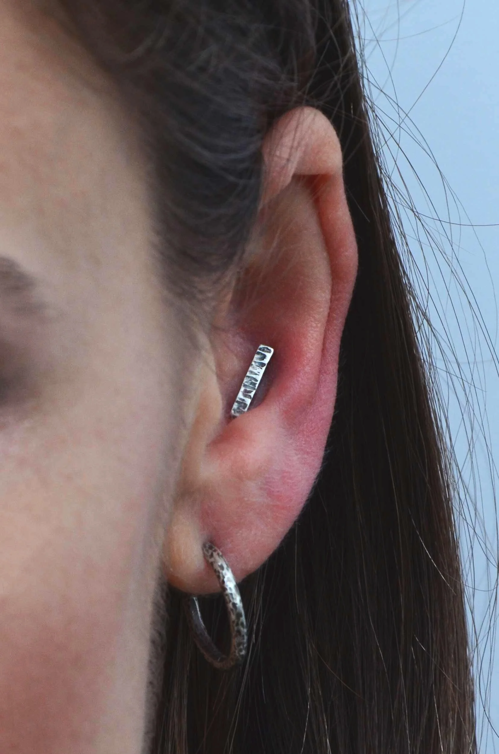 Copy of Oxidised conch stud from recycled silver on model handmade