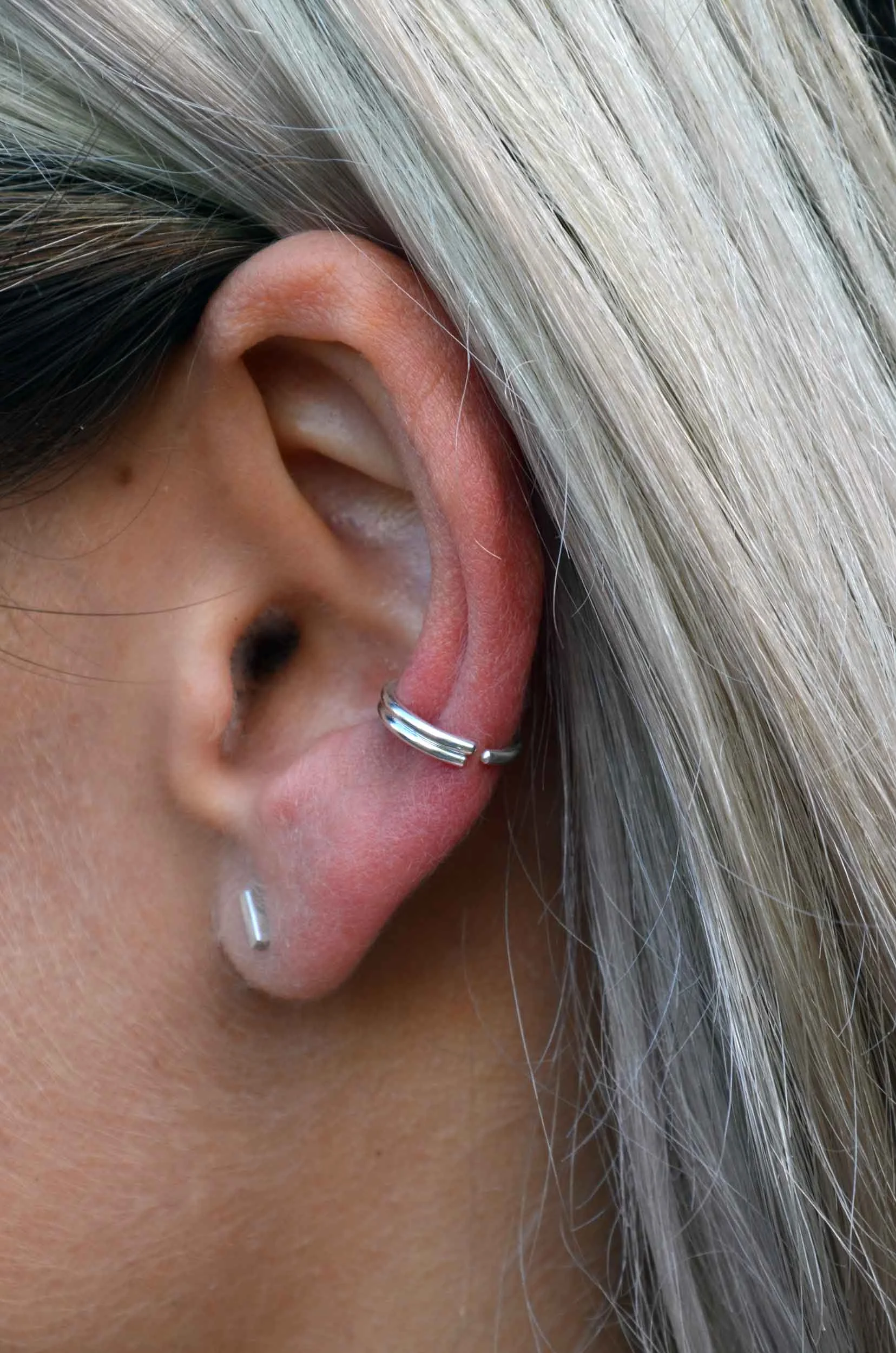silver conch hoop on model