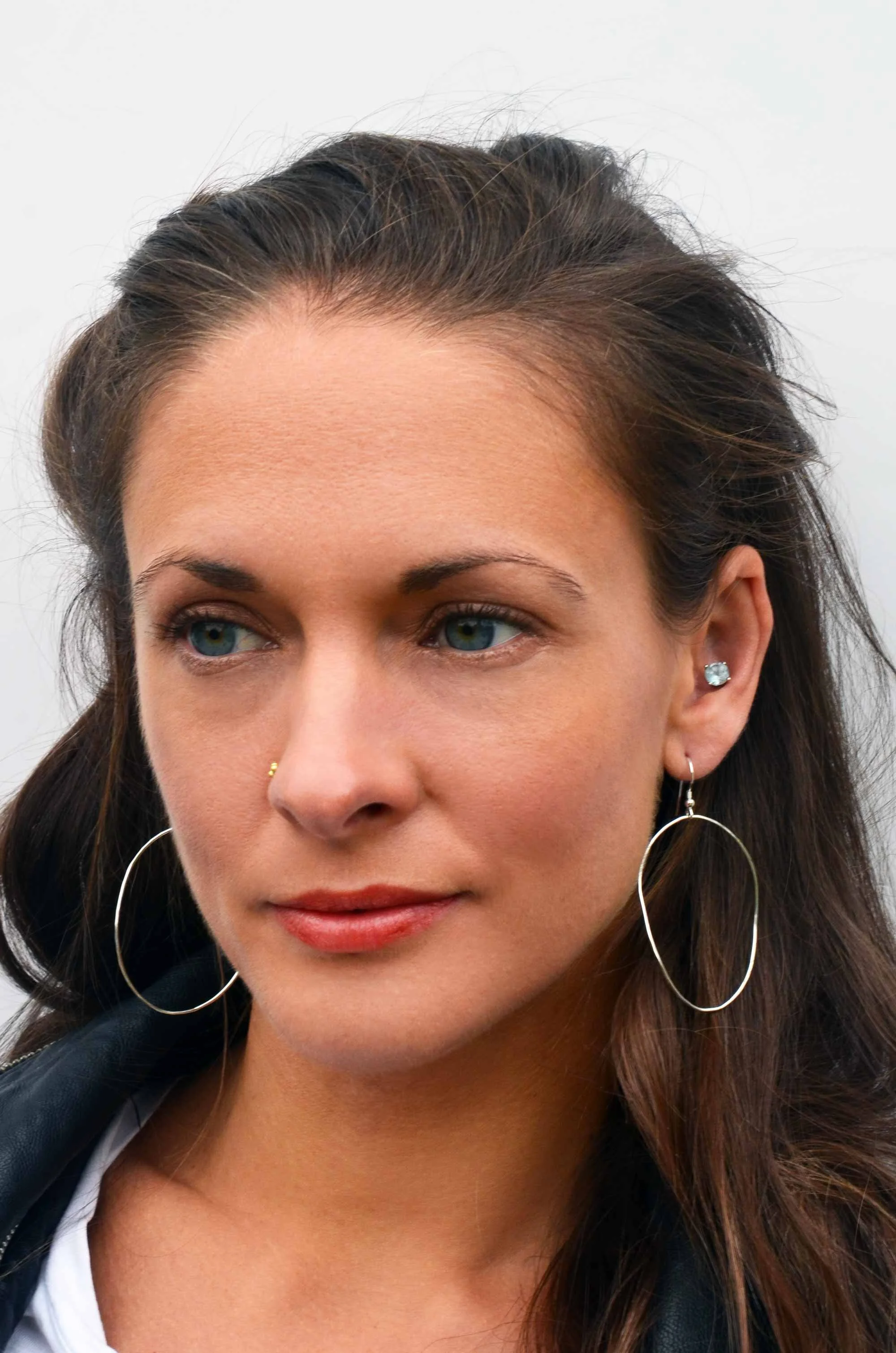 large sterling silver hoops earring handmade on model