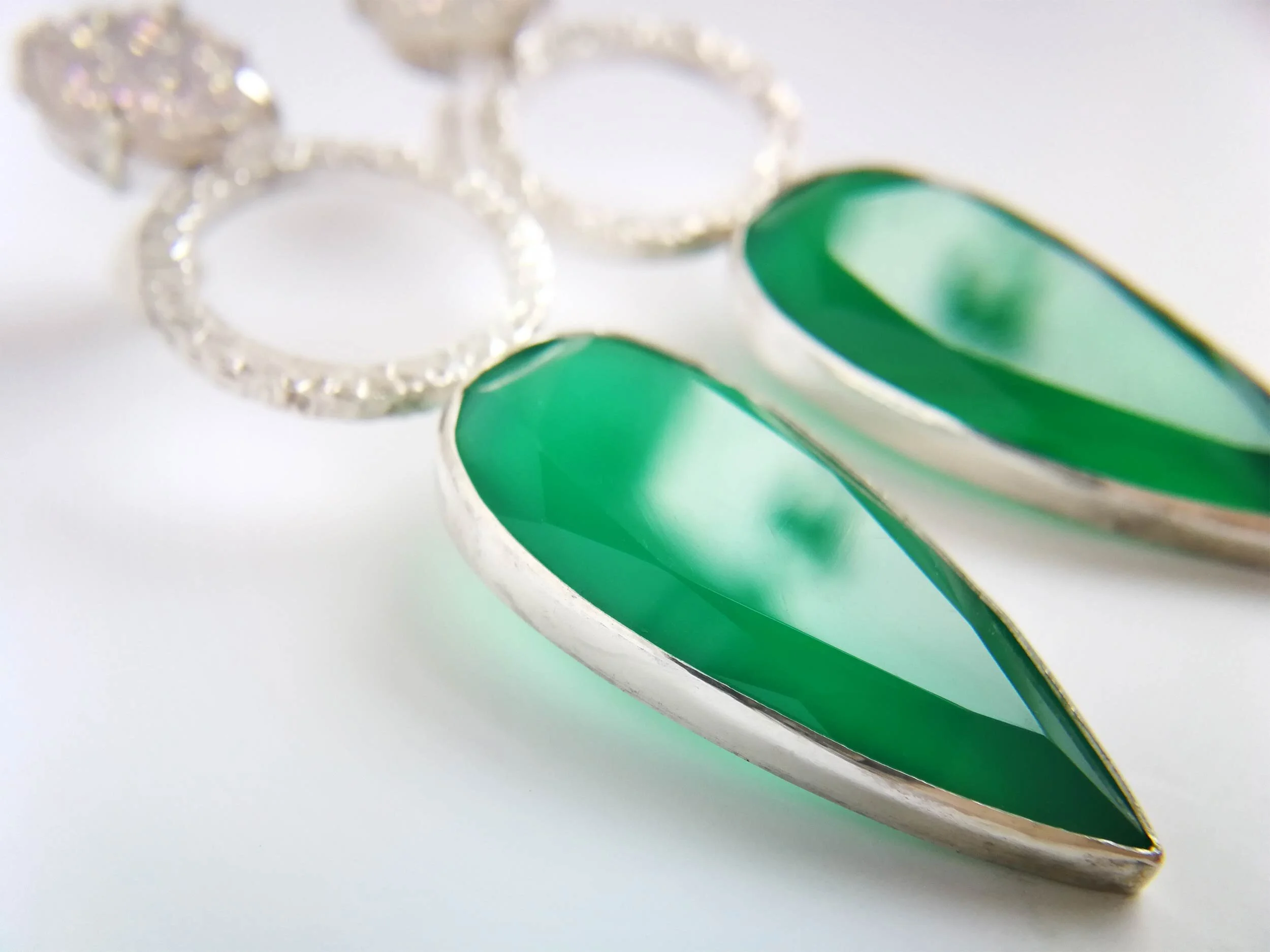green onyx and white druzy statement earrings close up