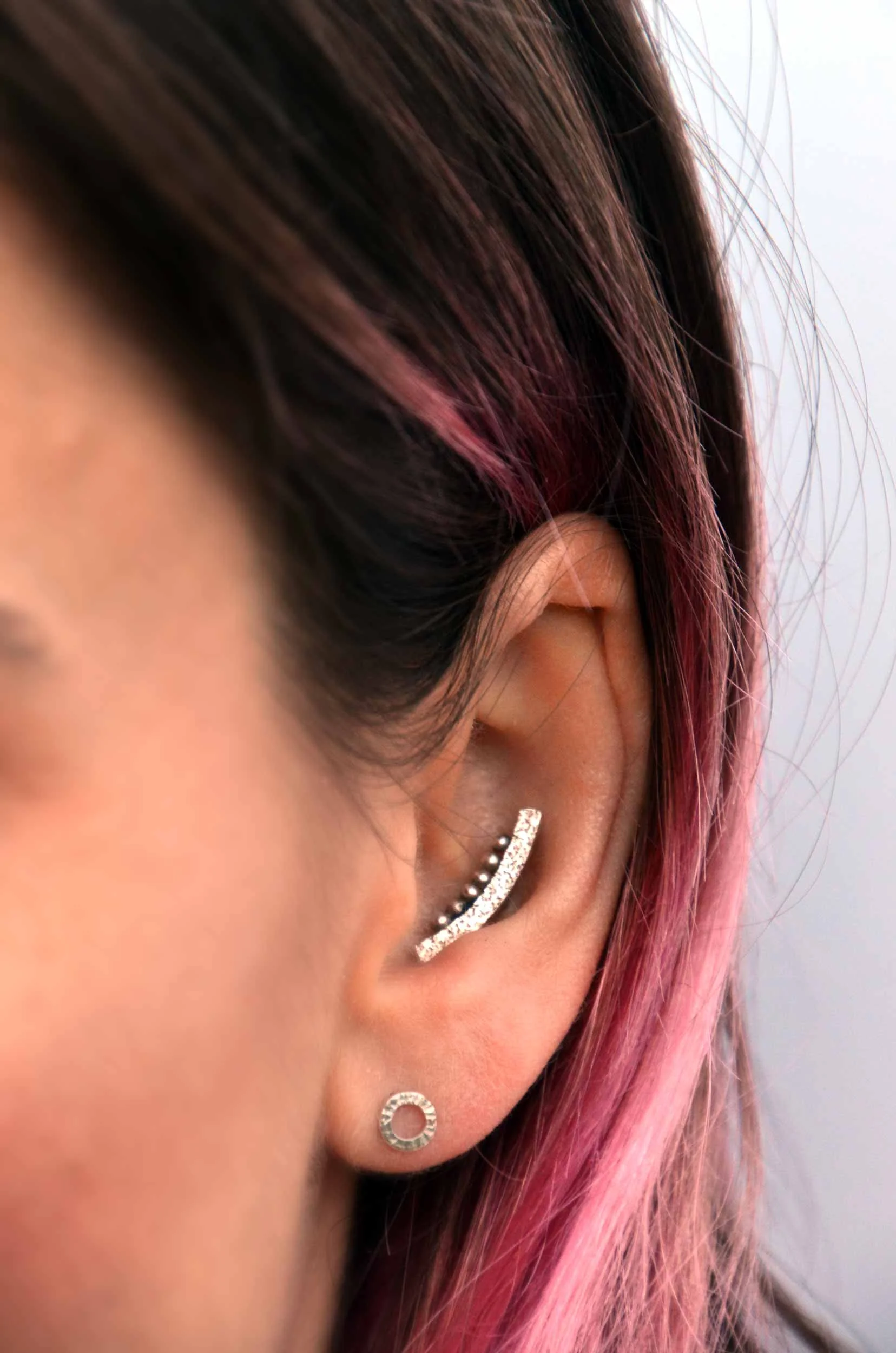 Handmade silver piercing jewellery on model