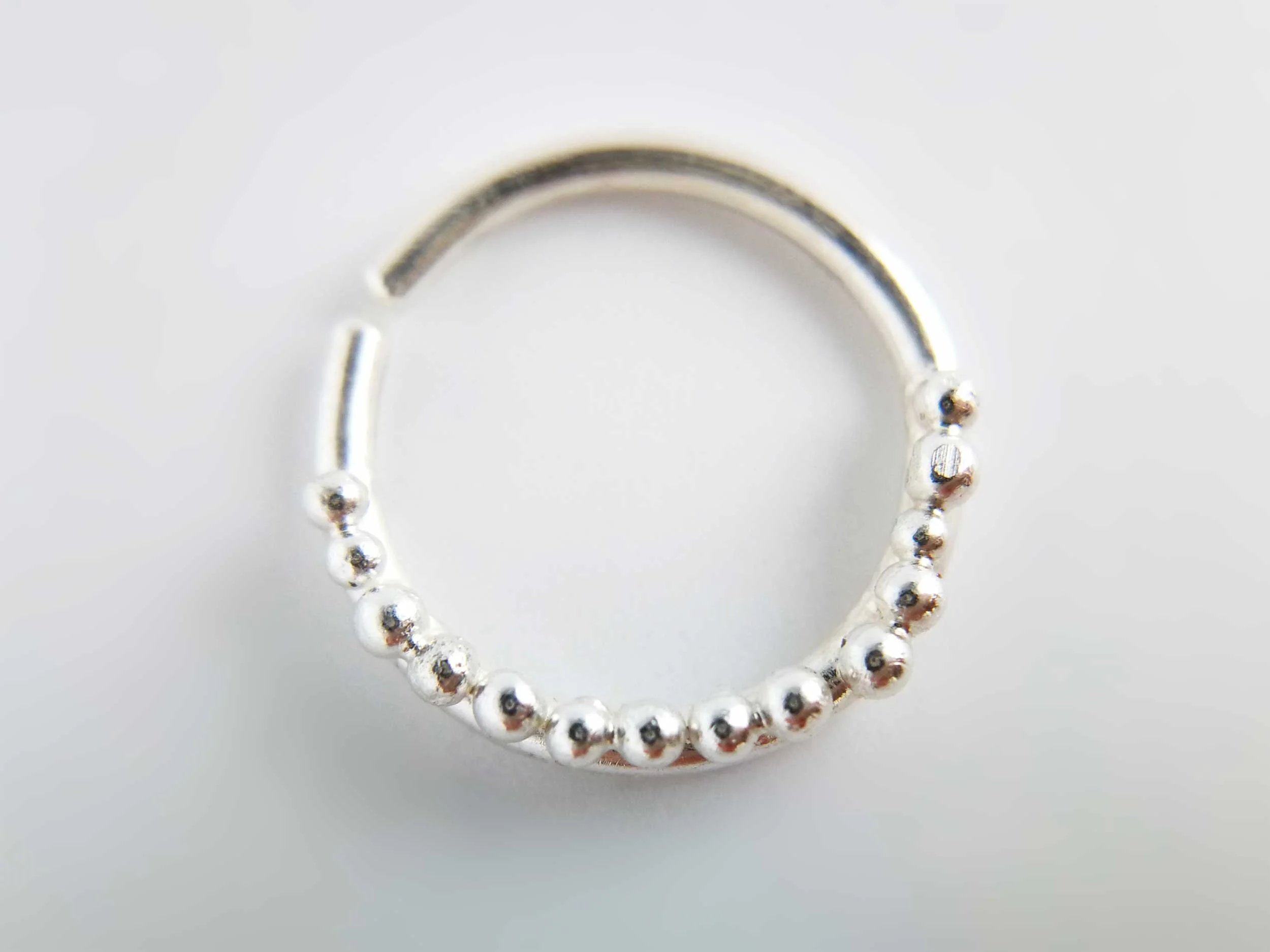 handmade indiam conch earring recycled sterling silver white background