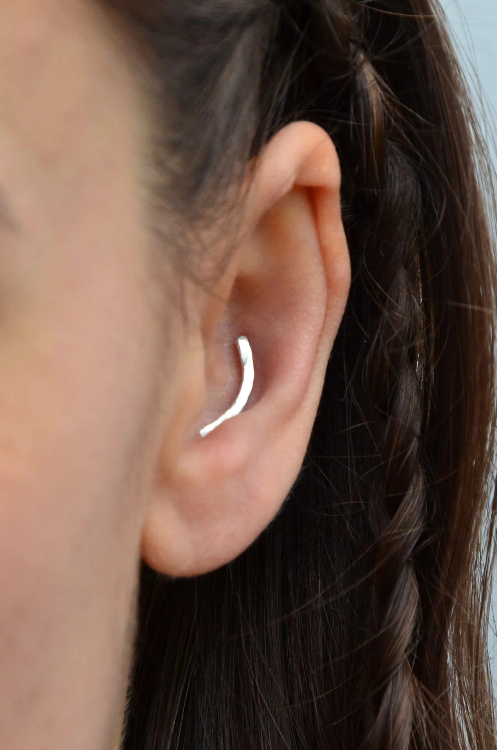 unique conch earring on model victoria grace clothes