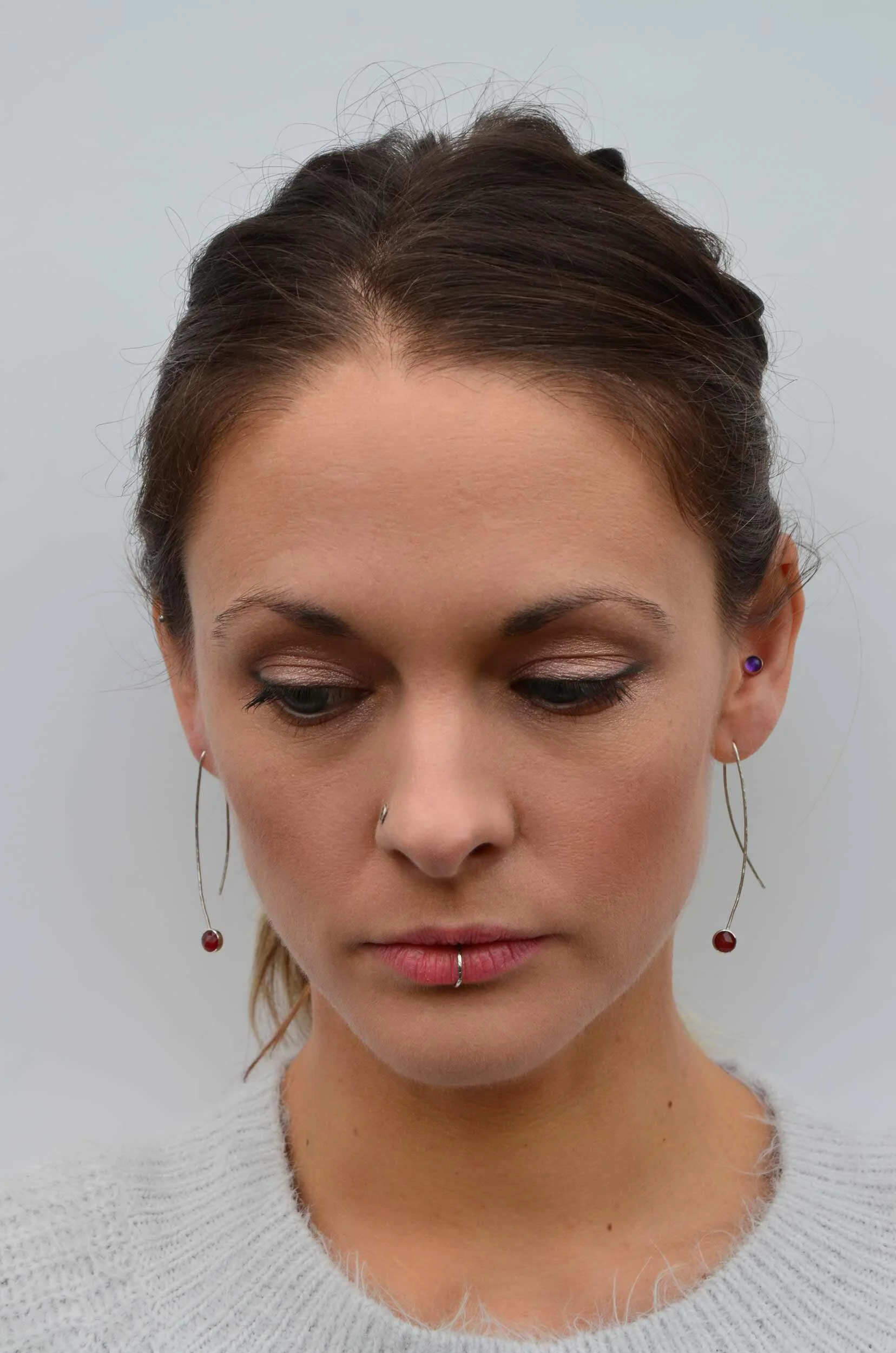 Carnelian statement earrings on model winterland collection