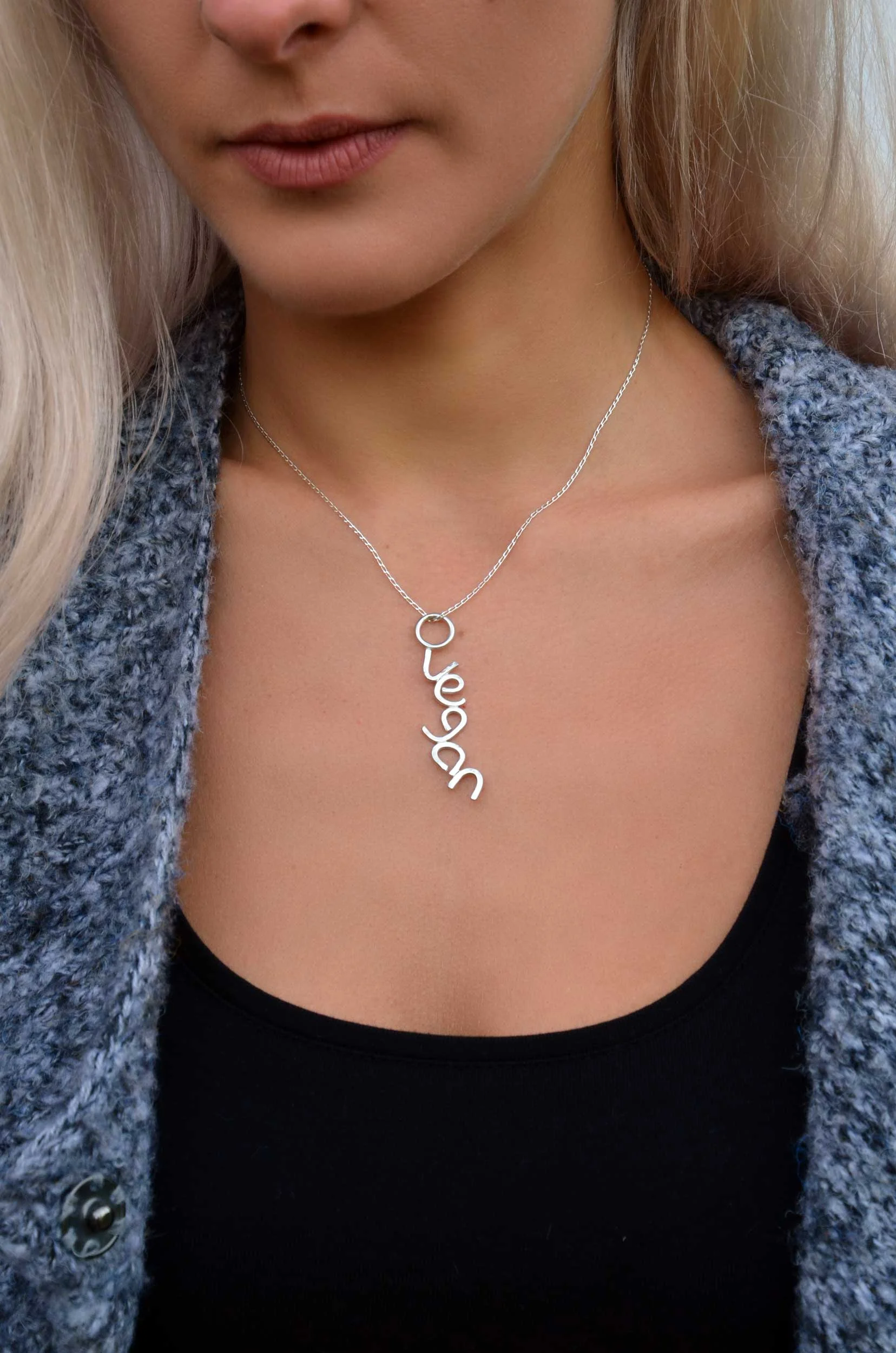 handmade vegan pendant on model
