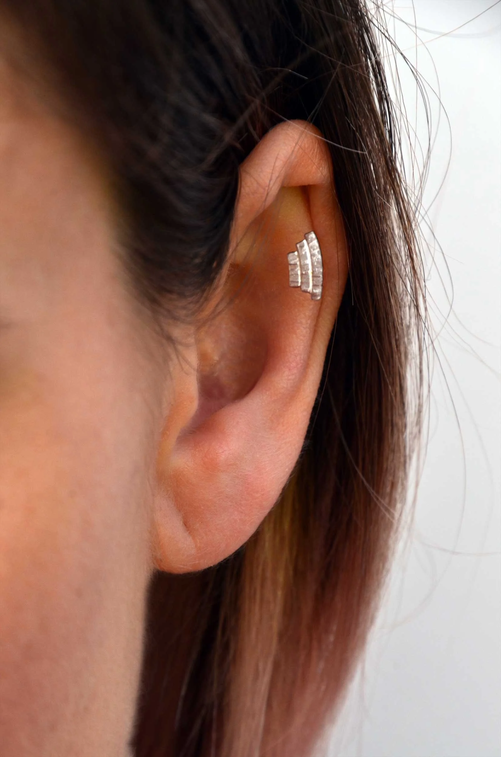 Recycled silver helix earring on model victoria grace silversmith