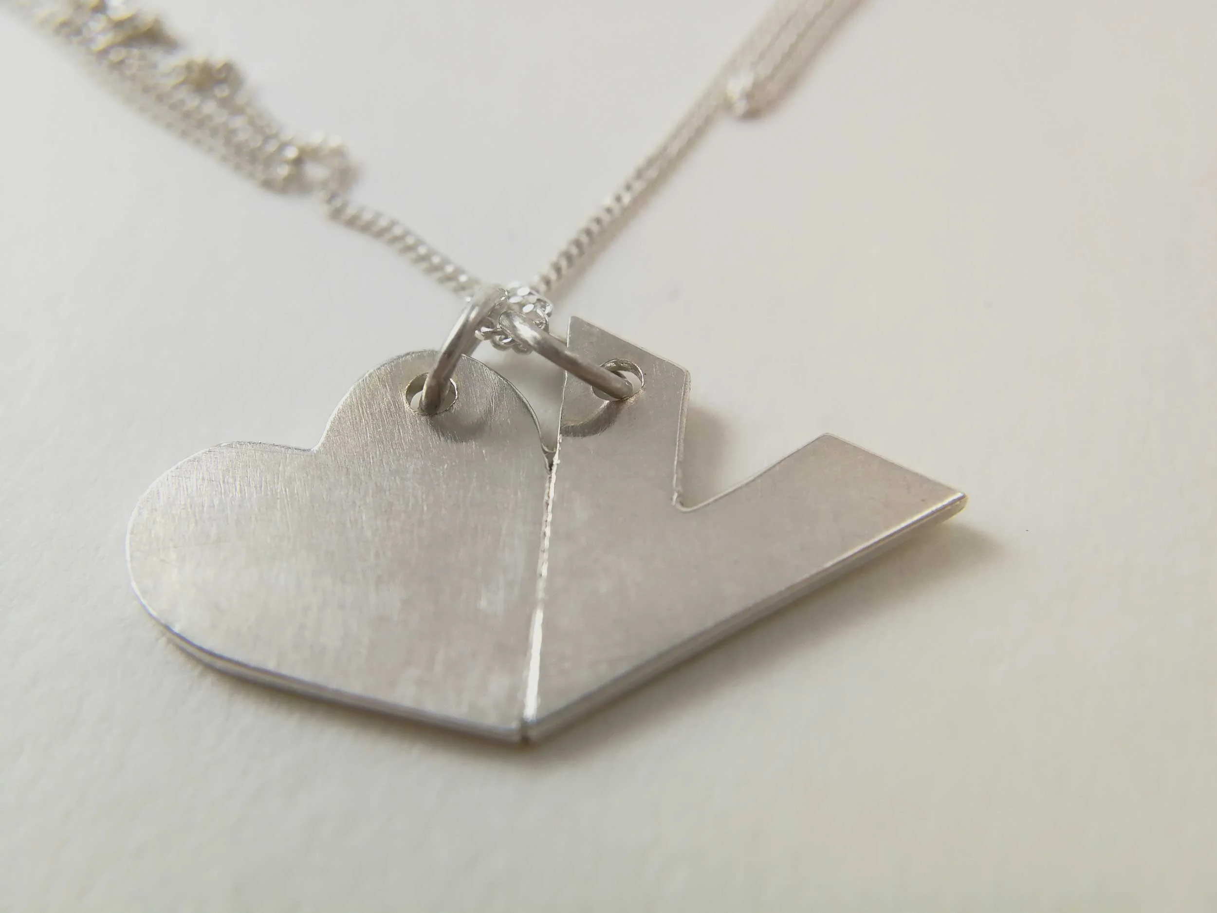 close up silver heart necklace vegan gift victoria grace silversmith
