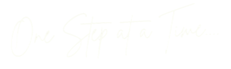 Text reading 'One Step at a Time...' in white cursive font on a black background.