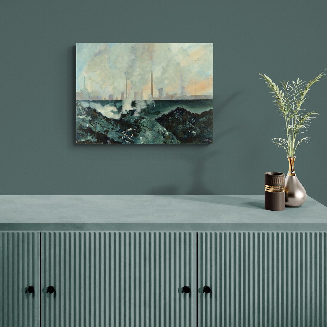 Decorative room with green wall, abstract landscape painting, green cabinet with slatted doors, black candle holder, silver vase with green plant.