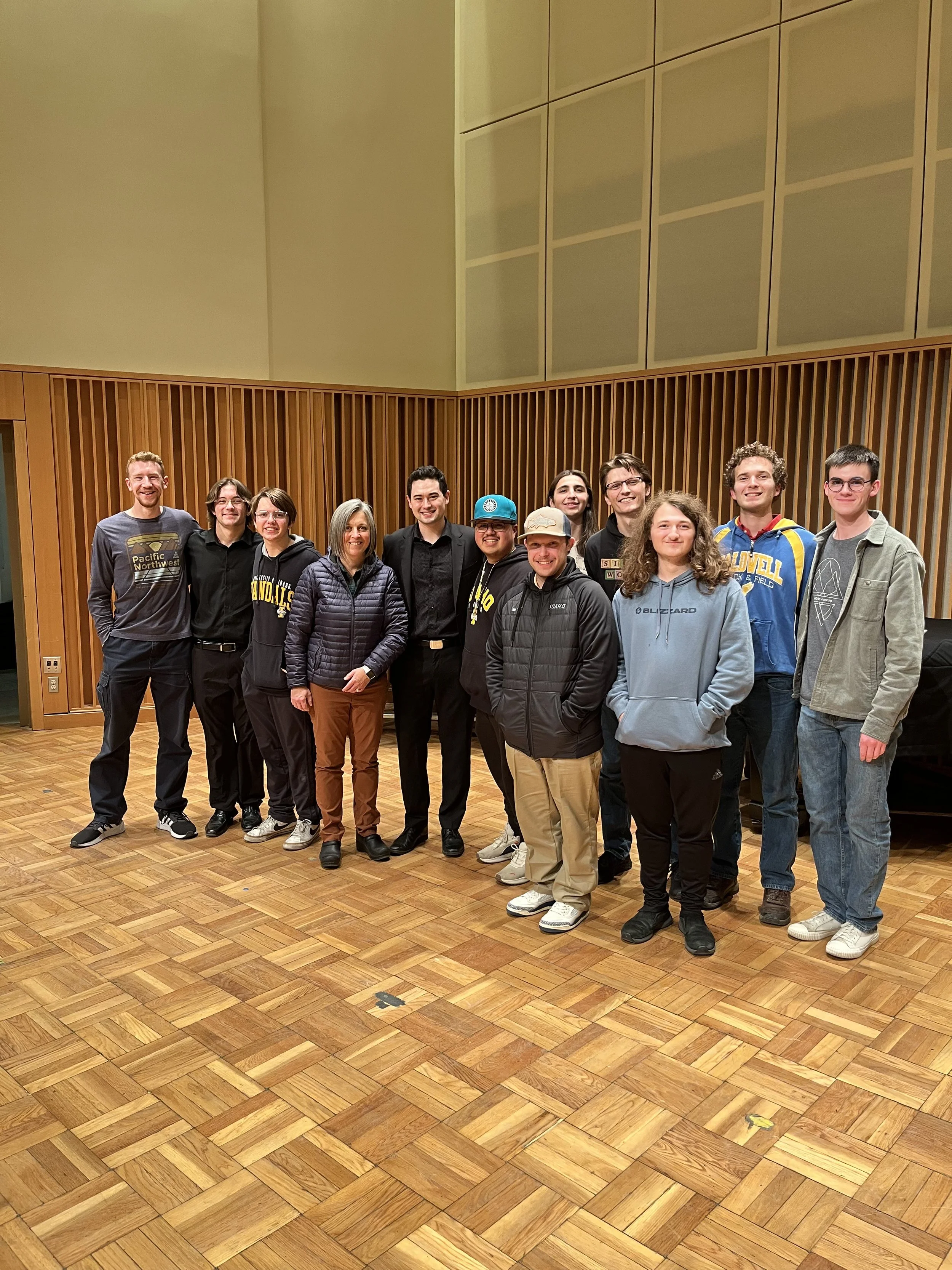 Landon Chang performing a residency recital at the University of Idaho with saxophone students from the University of Idaho saxophone studio.