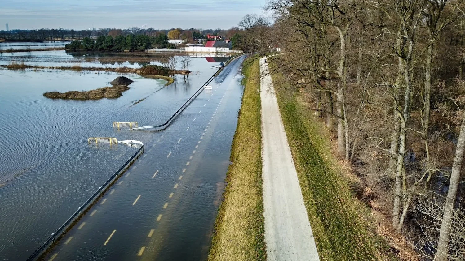 A flooded road and fields in Wroclaw, Poland