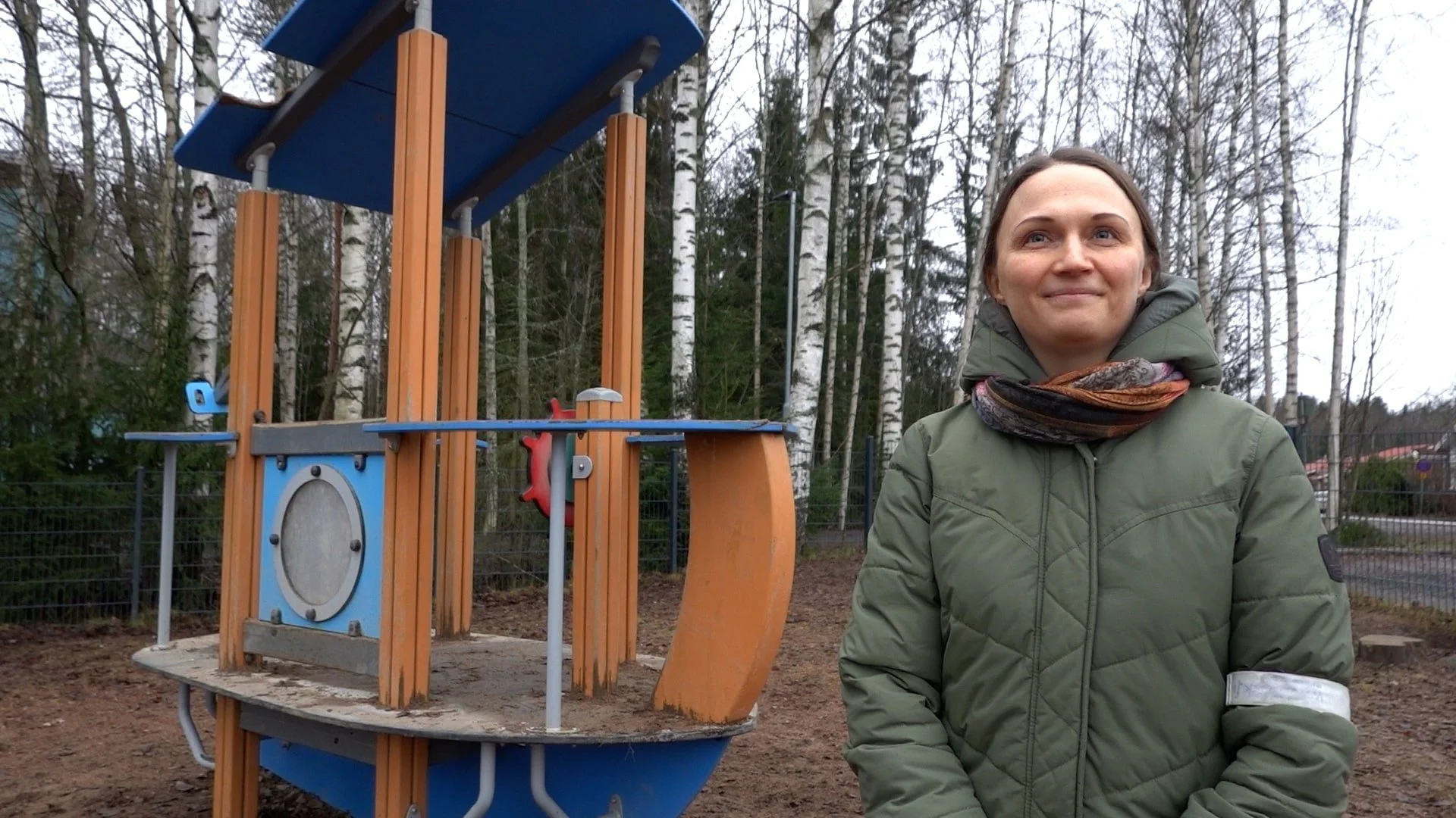 Tytti Pasanen standing infront of a forest and play equipment in Tampere, Finland