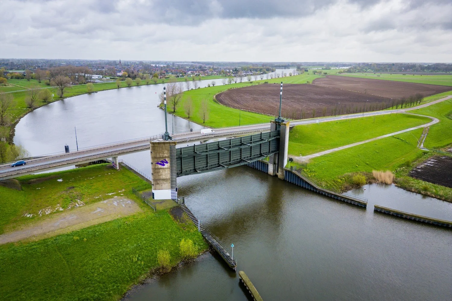 Aerial drone view of the Kromme Nol flood barrier along the river Maas.