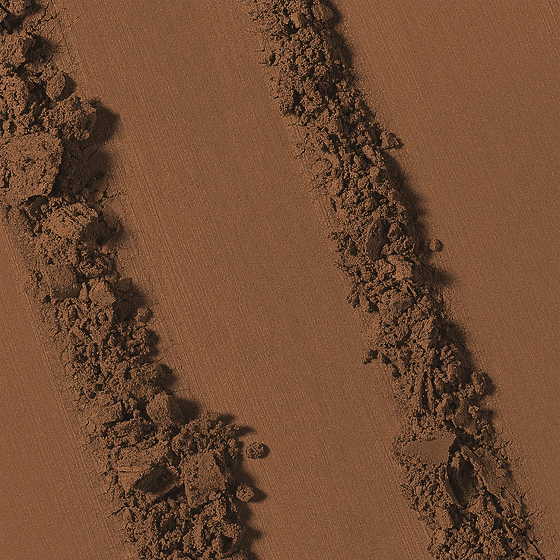 Highlighter and powder texture visuals for beauty campaign art direction