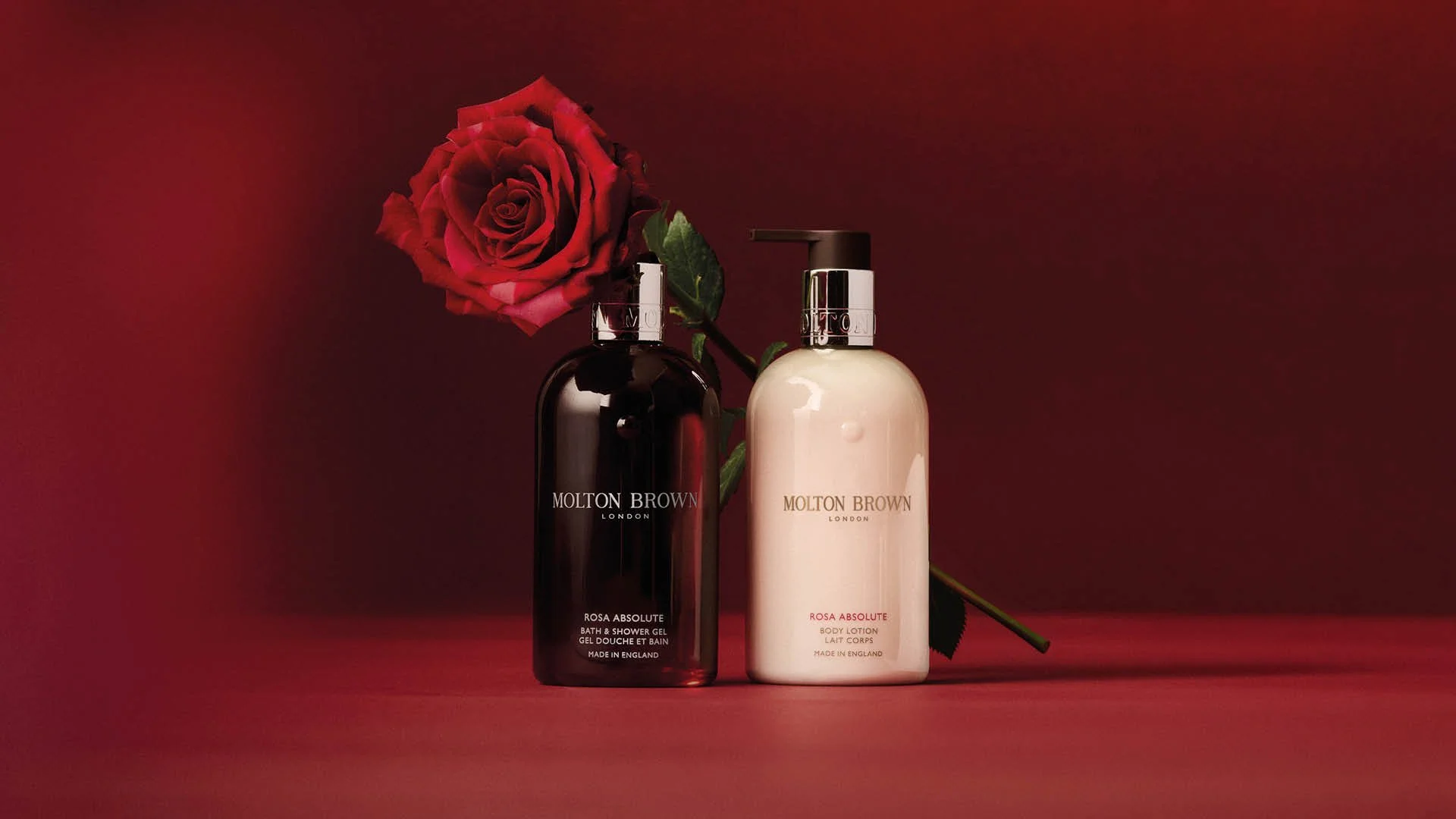 Molton Brown fragrance collection styled within a cohesive Evergreen colour system using a tonal backdrop.