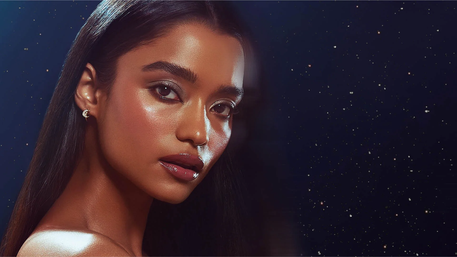 Model against starry blue sky