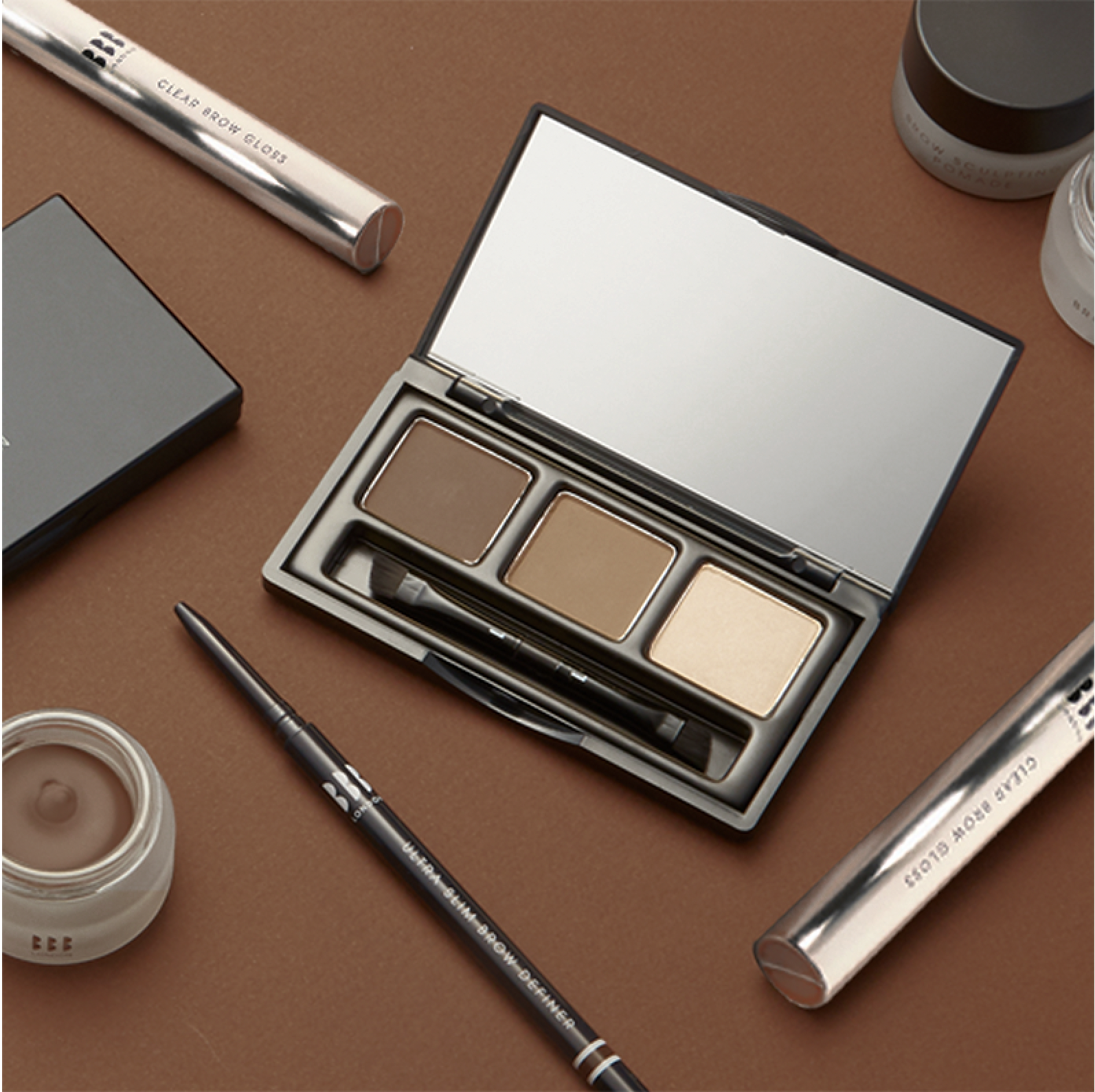 Brow product lineup arranged on neutral surface