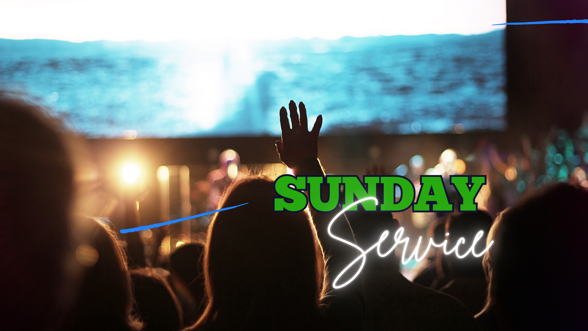 Audience watching a concert with a large screen in the background, one person raising their hand, overlay text reads 'Sunday Service'