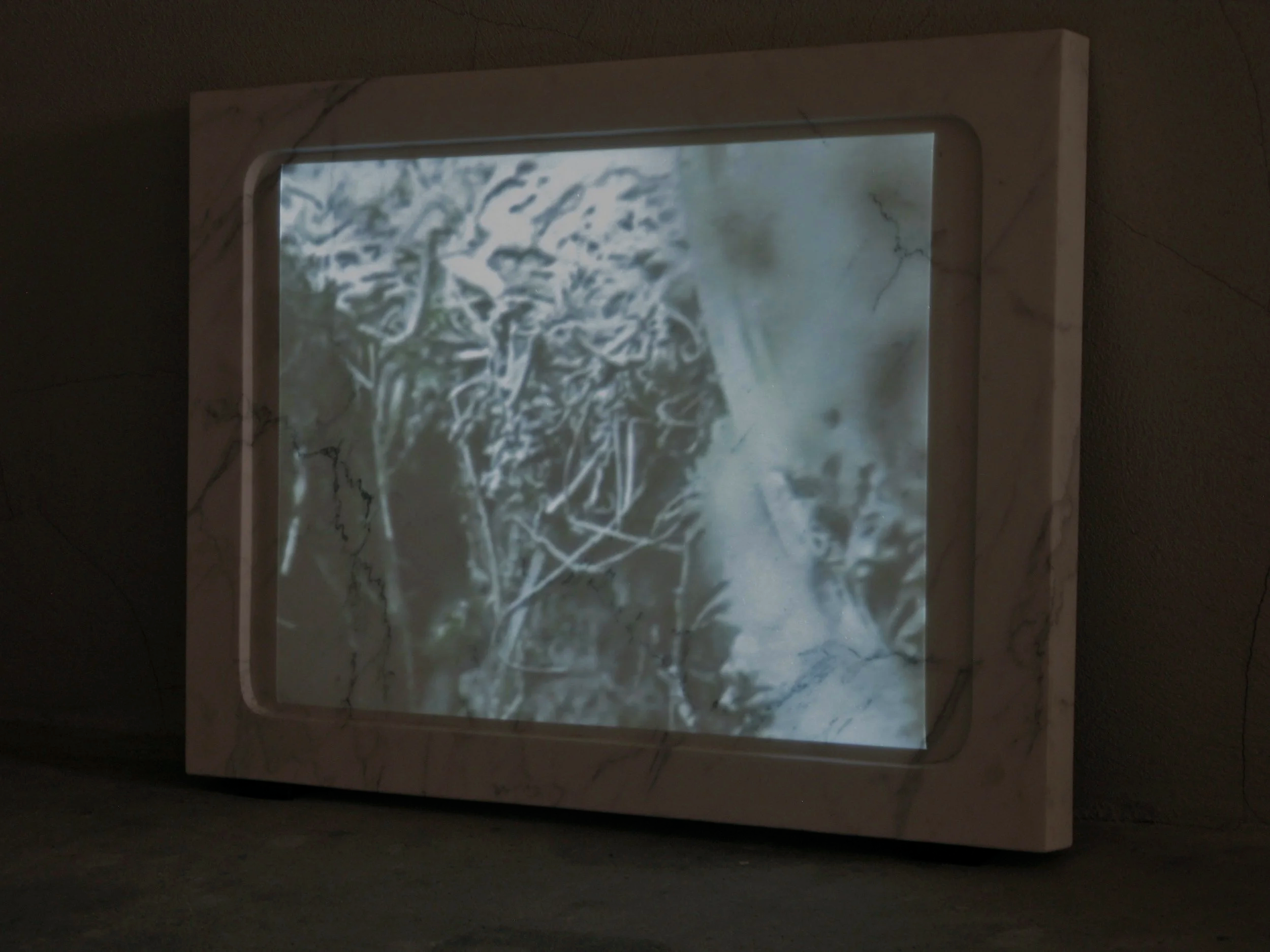 psychogeographie III, 2010. Video projection on marble screen, 90 cm  x 65 cm