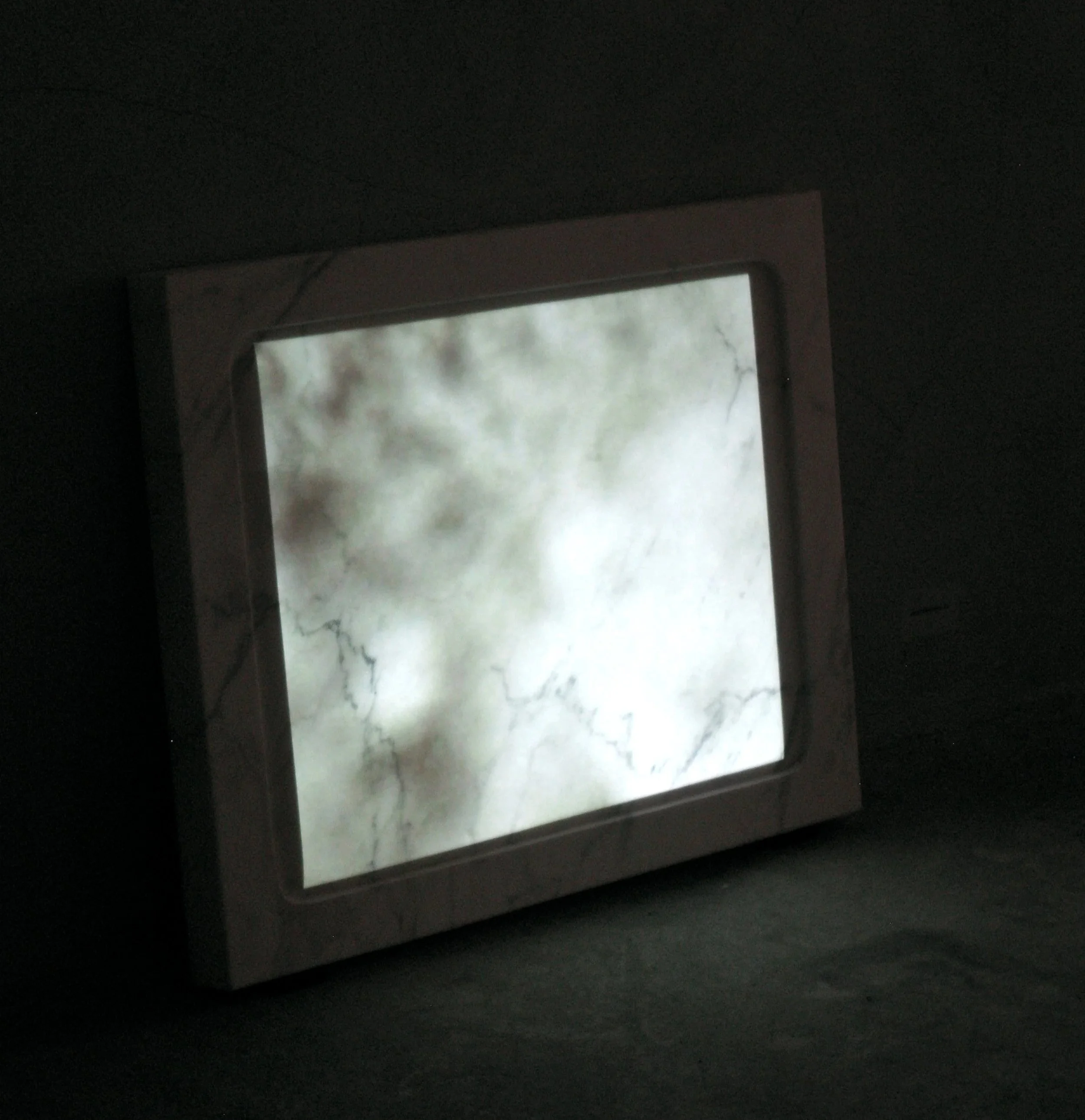 psychogeographie III, 2010. Video projection on marble screen, 90 cm x 65 cm