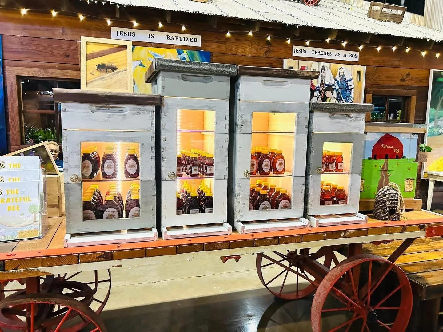 Have you seen our beautiful honey setup at Berrys? Jeremy worked so hard designing and building these beautiful beehive cabinets. Our friend Tiffany Gaspar Galle helped paint all the cabinets and Addison worked hard painting a beautiful hive just for