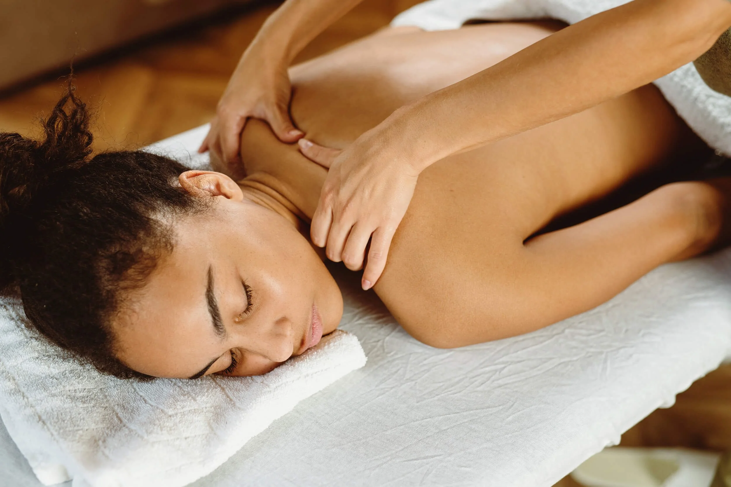 Deep tissue massage with female massage therapist in Midlothian, VA