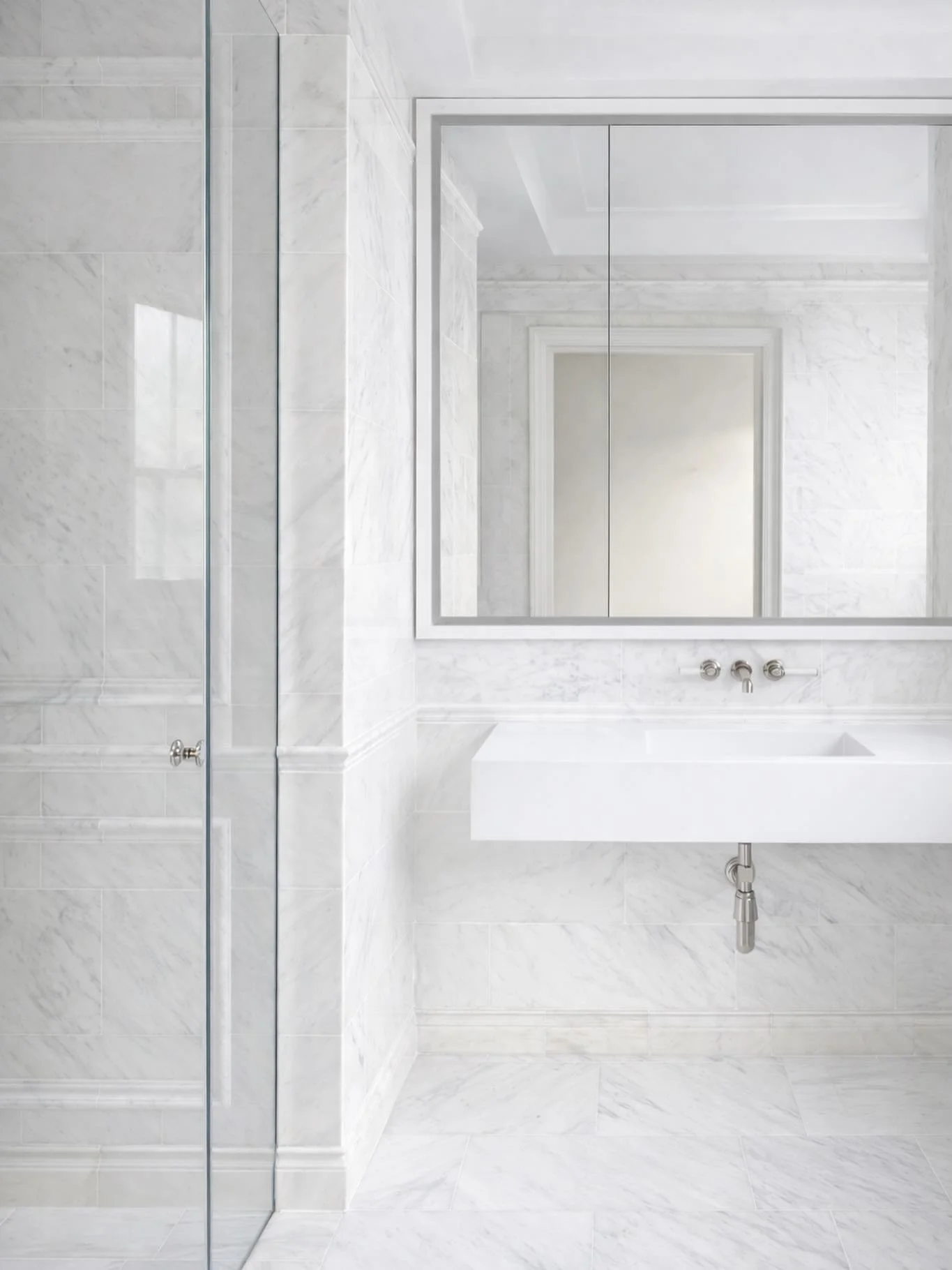 In this recently completed Belgravia residence, contemporary lines are softened by the natural beauty and quiet luxury of traditional marble