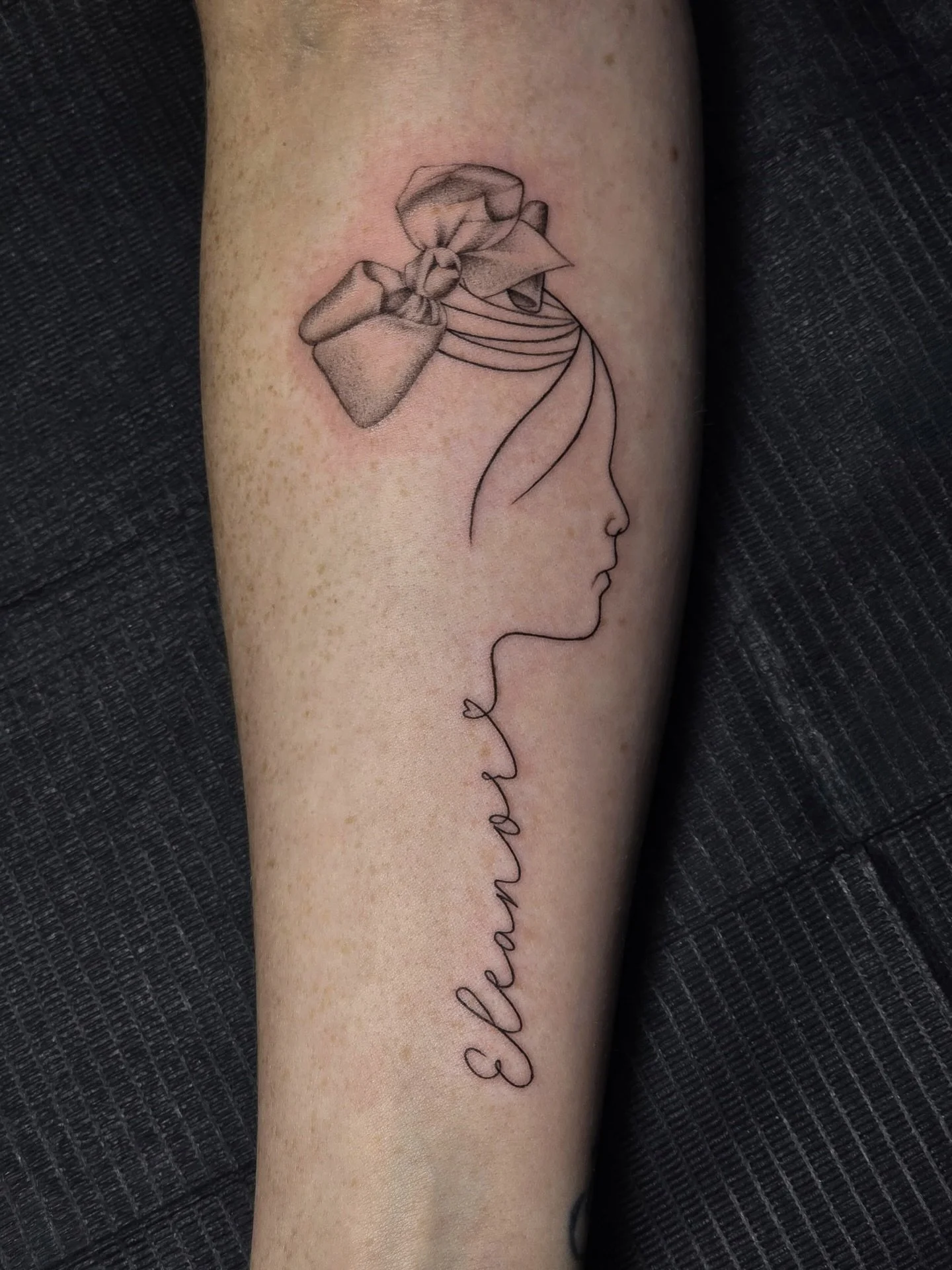 Fine lines, soft details, and a name that lives forever on the skin🎀
.
.
Tattoo Artist: @ambrosia_tattoos 
.
.
Lagrange, GA